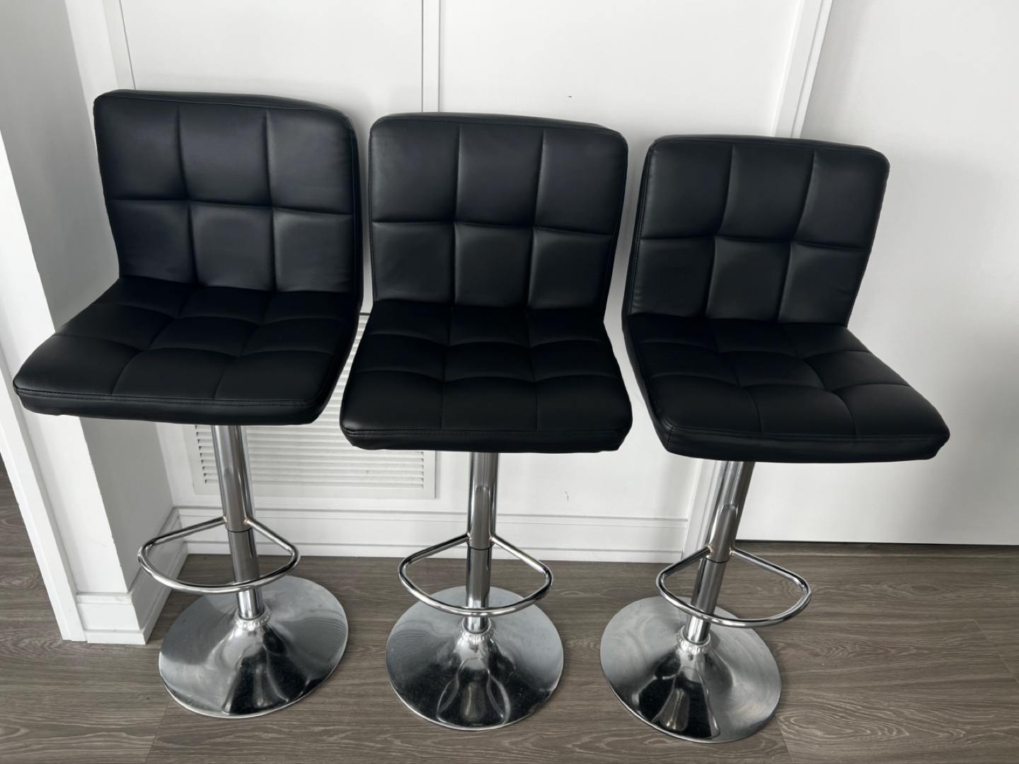 One Black Leather Bar Stool