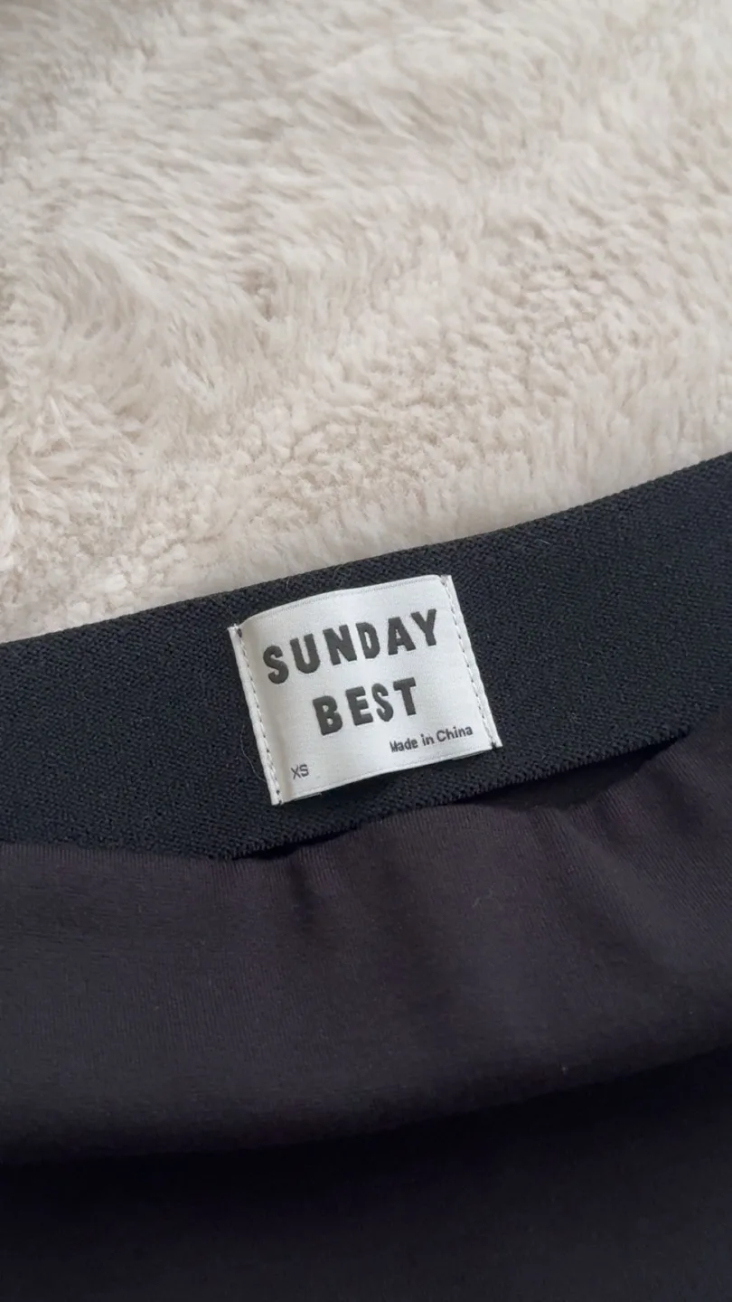 Aritzia Sunday Best Black Mini Skirt image indicator(2)
