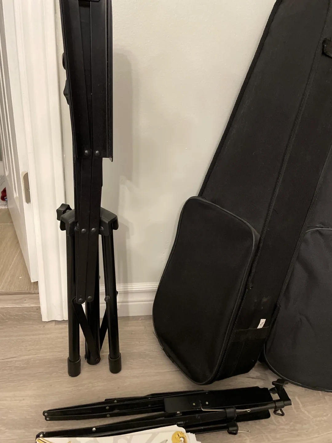 Two violins with cases, accessories, and stand image indicator(5)