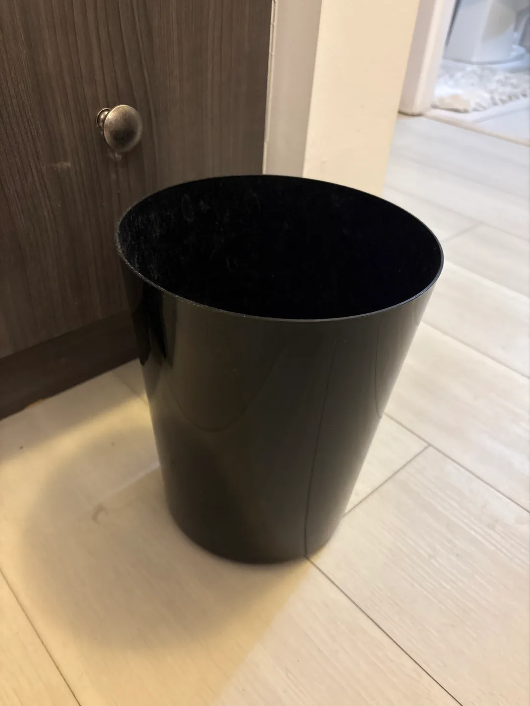 Black plastic garbage bin thumbnail