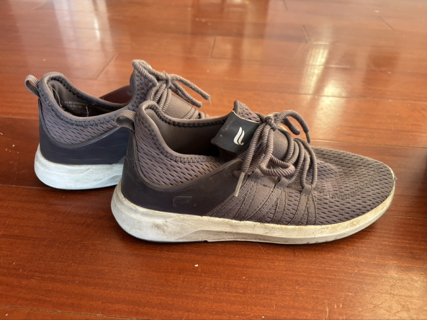 Pair of Grey Running Shoes and Black Timberland Boots - photo 2