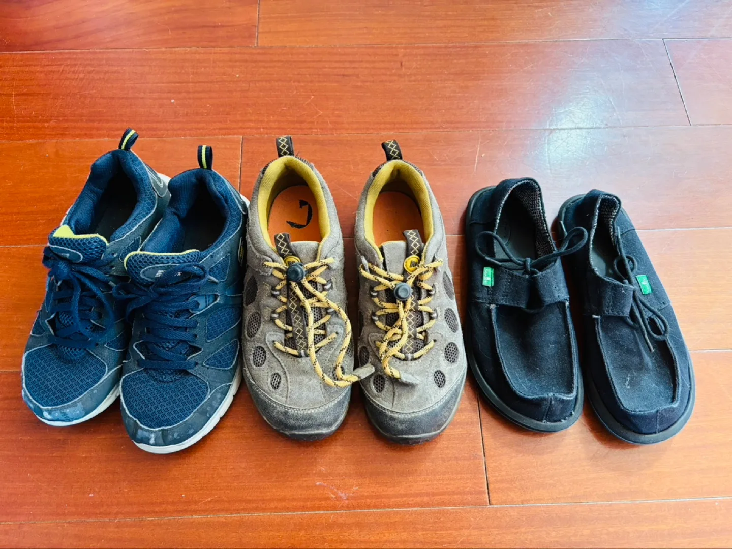 Three pairs of used shoes - Merrell, Sanuk, Skechers thumbnail
