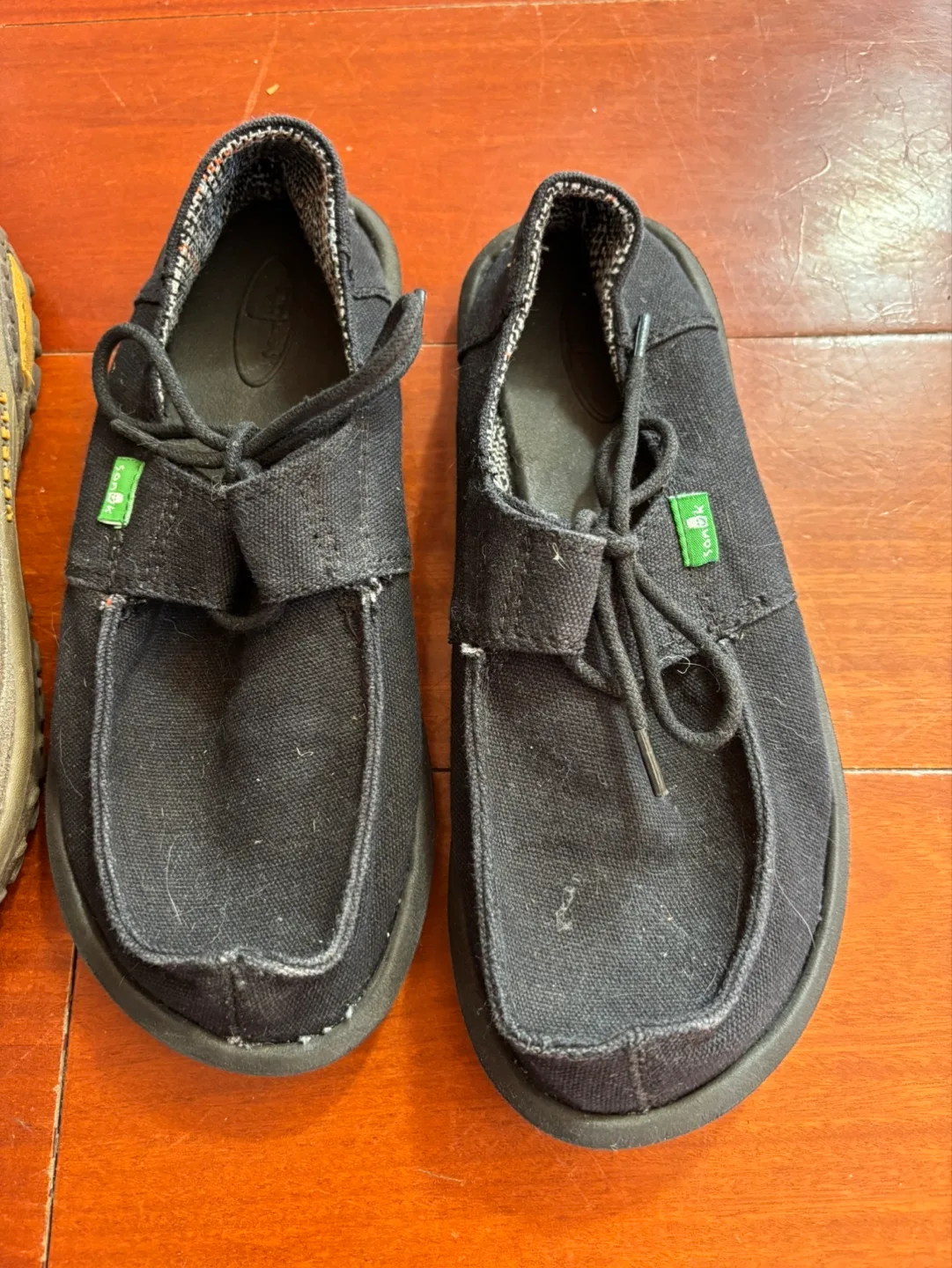 Three pairs of used shoes - Merrell, Sanuk, Skechers image indicator(4)