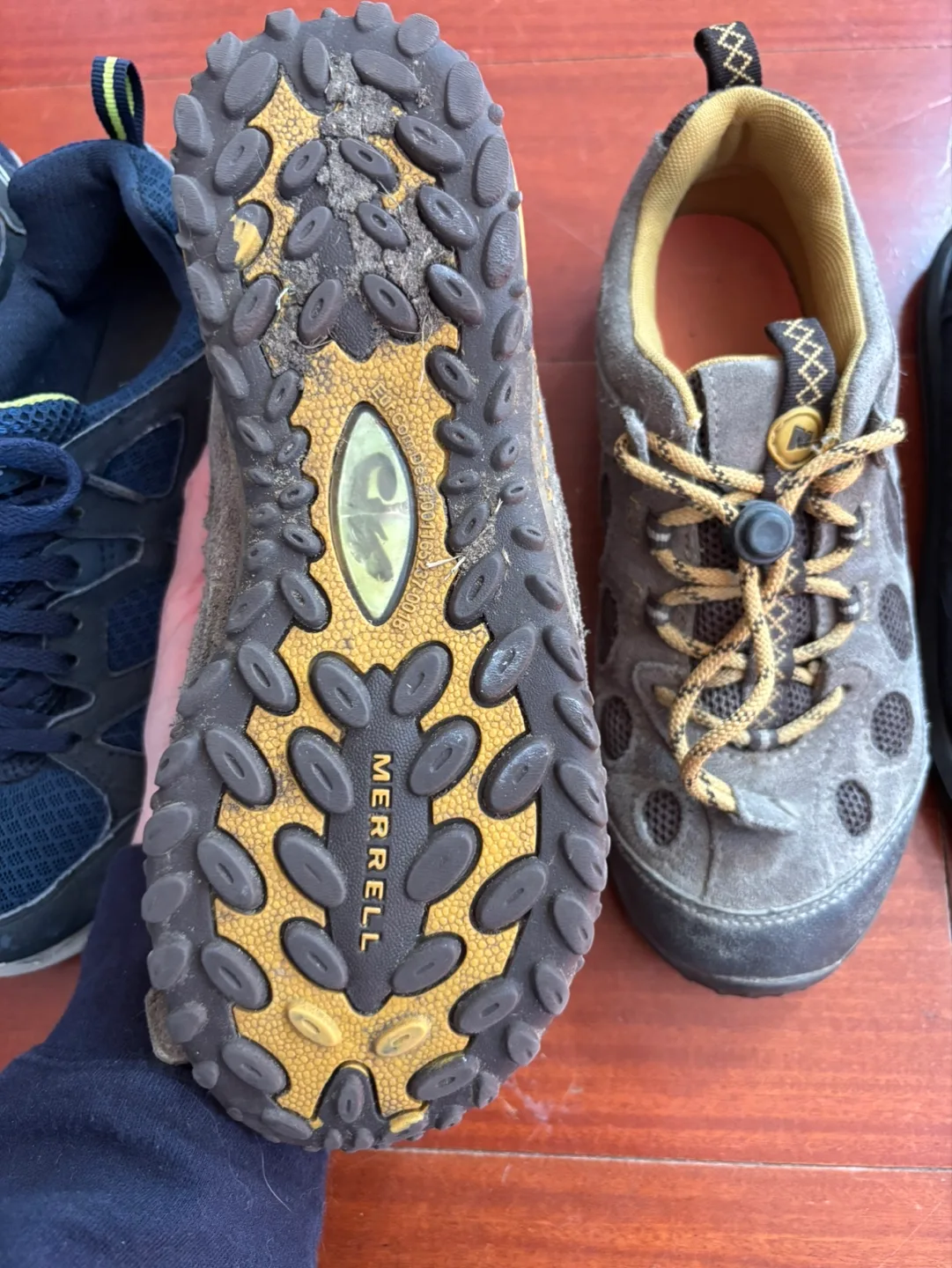 Three pairs of used shoes - Merrell, Sanuk, Skechers image indicator(3)