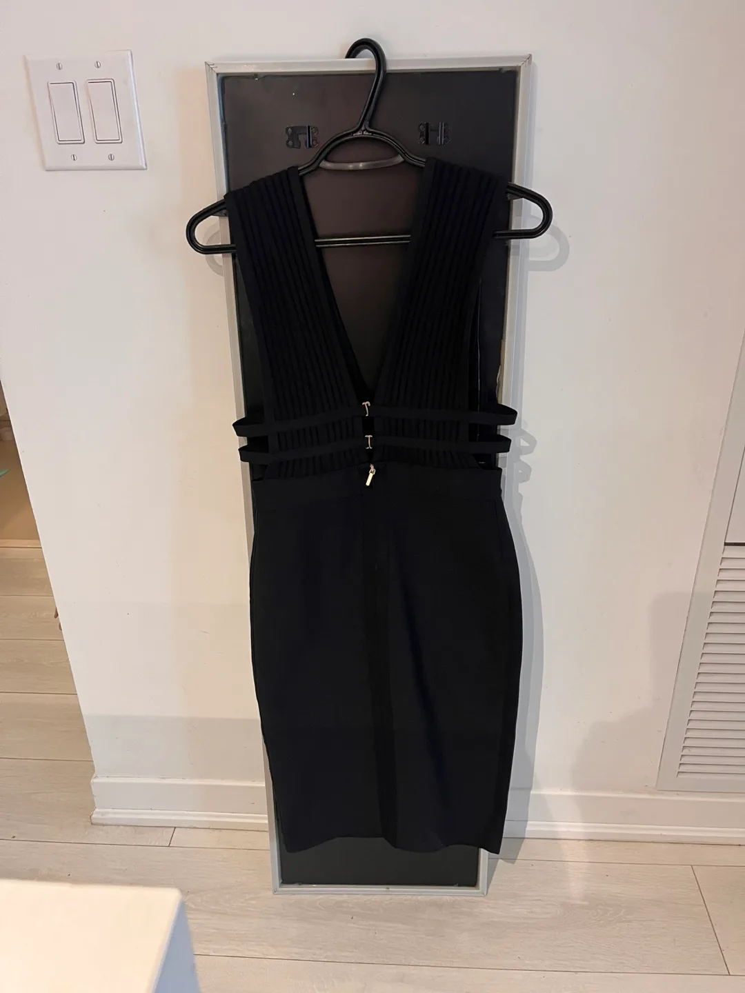 Black bandage midi dress with cutouts image indicator(2)