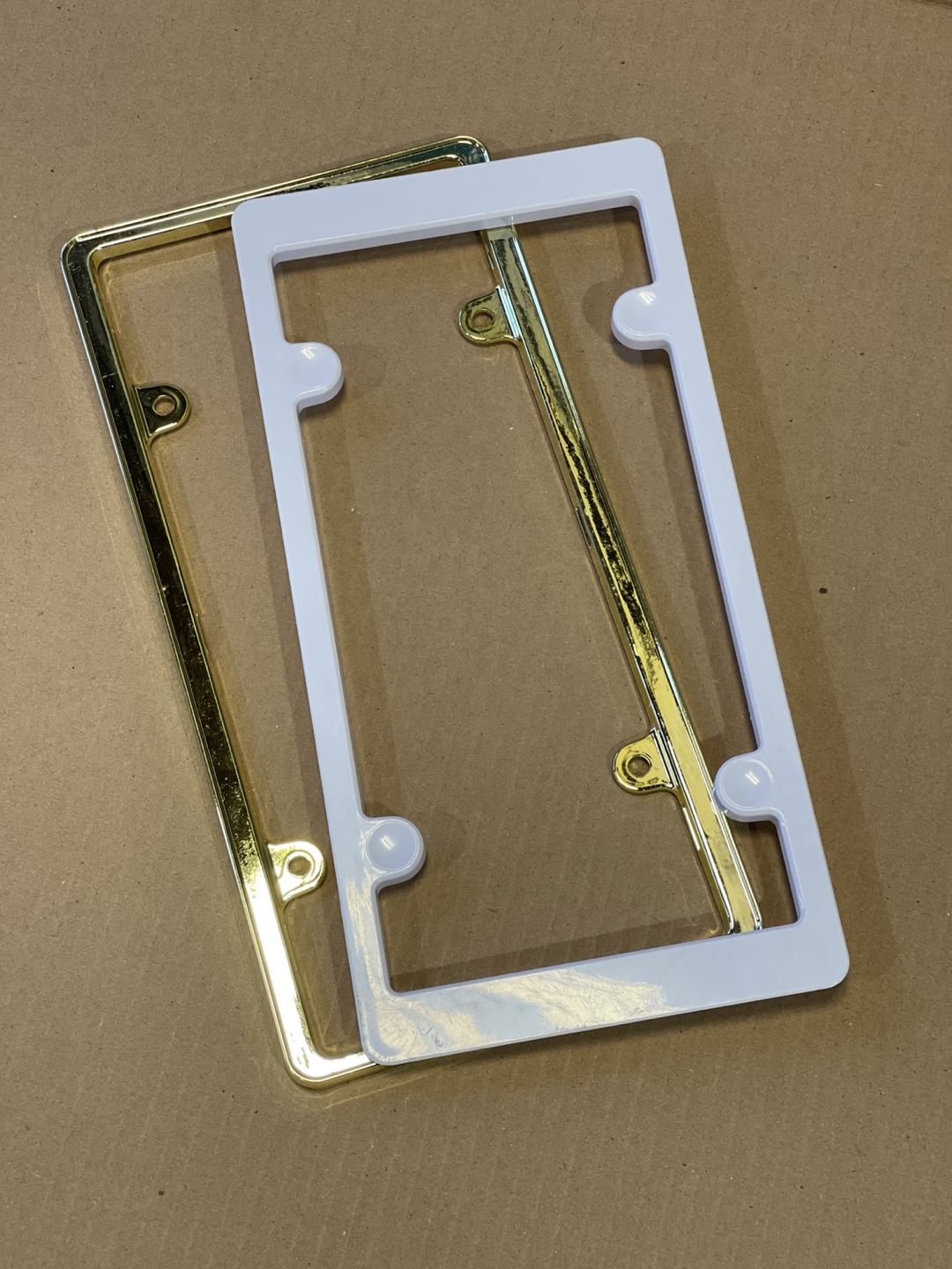 Two Licence Plate Frames: Gold & White