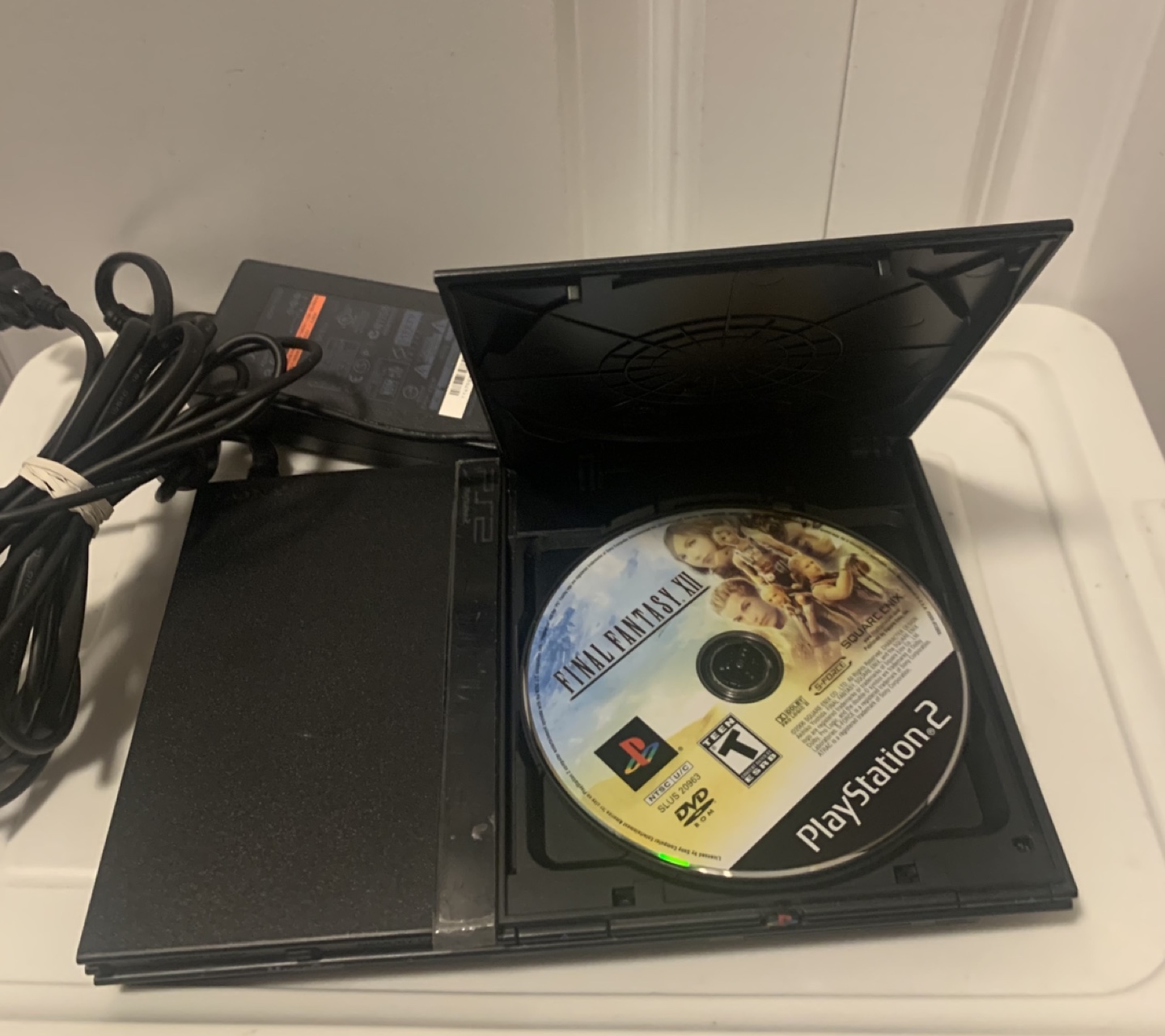 Sony PlayStation 2 Slim Console with Power Supply and Game