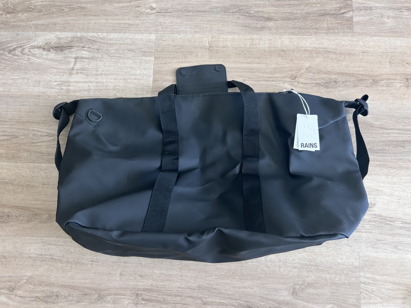 RAINS Black Waterproof Travel Duffle Bag