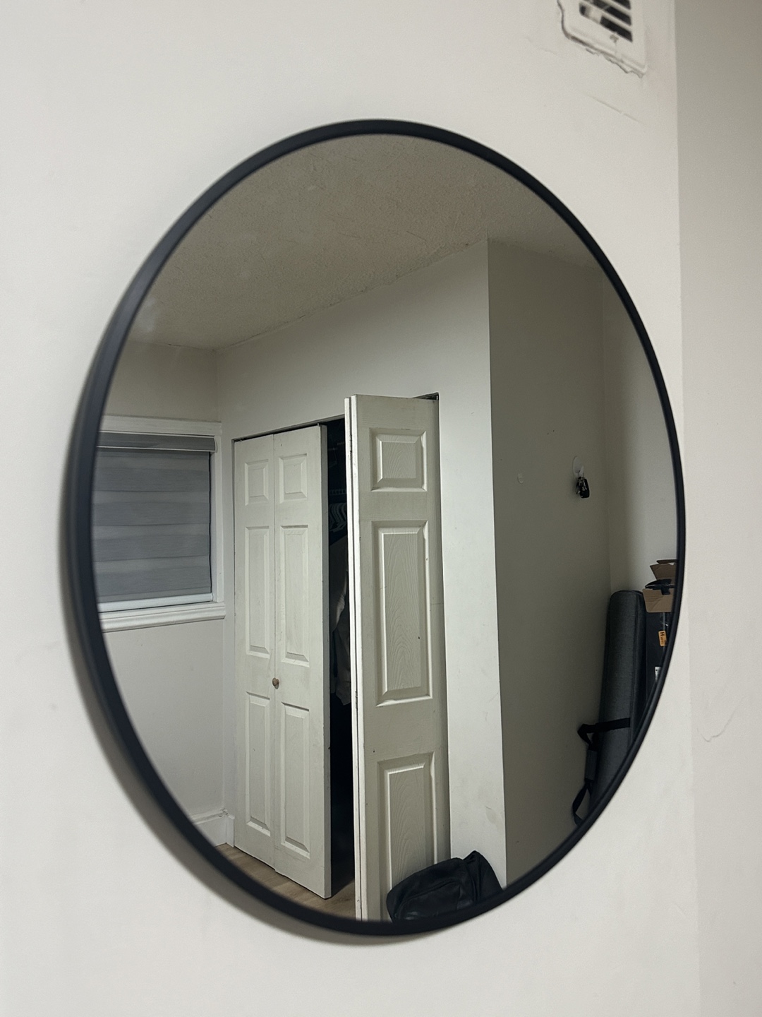Round Black Framed Wall Mirror