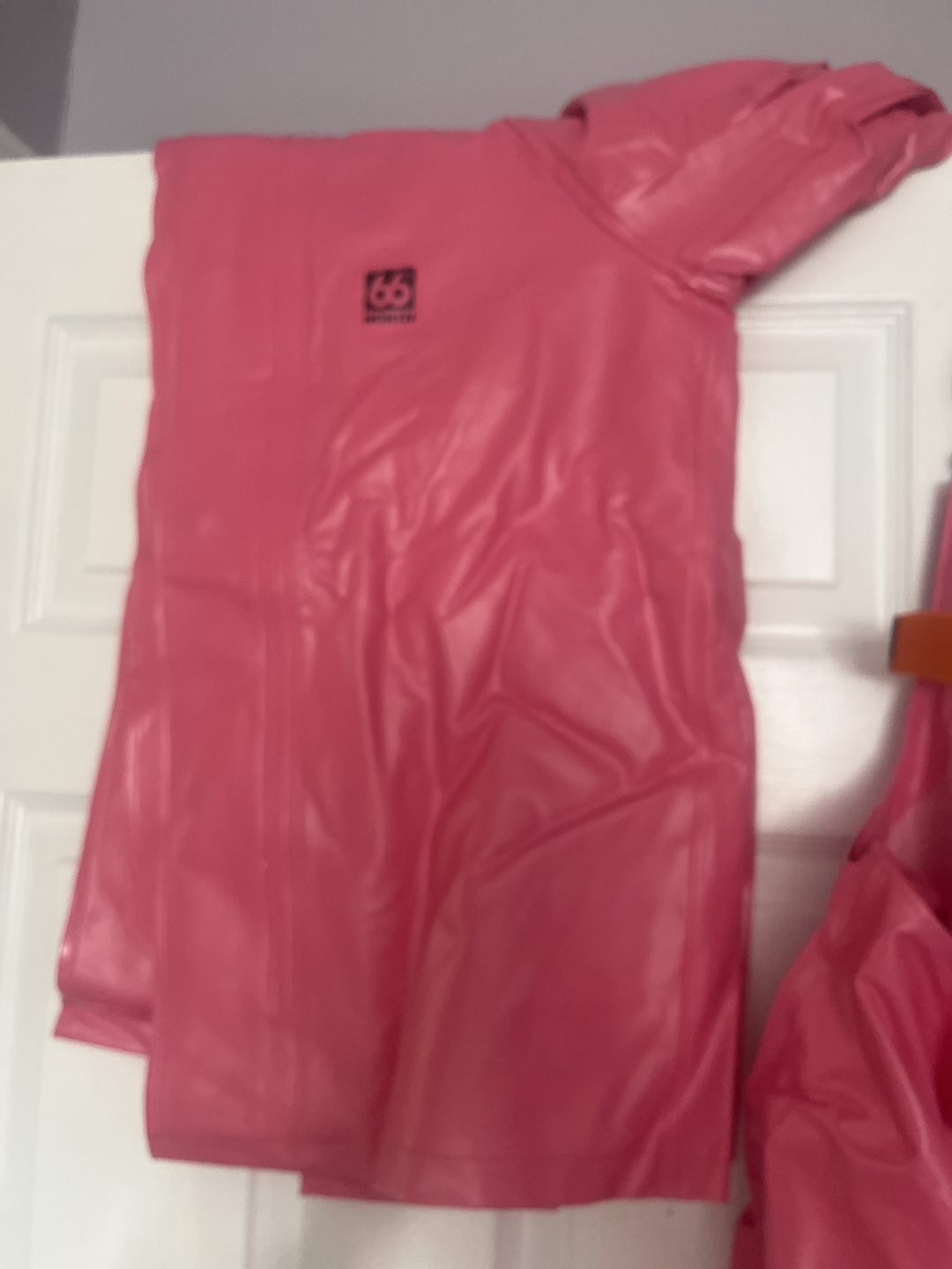 66 North Pink Rain Suit