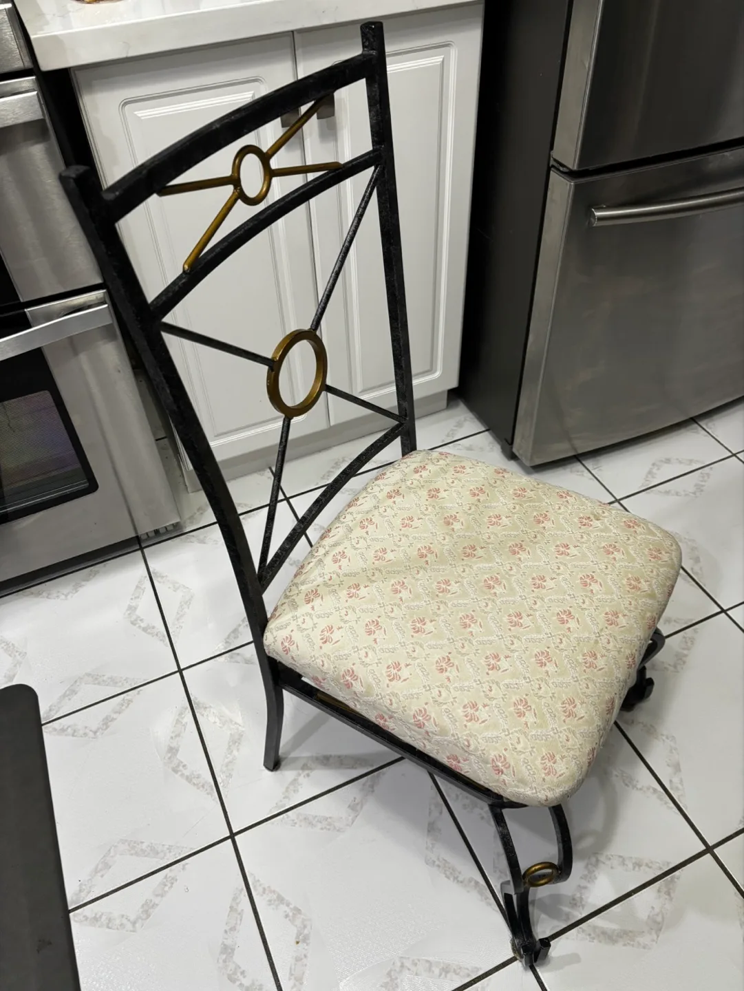 Elegant Black Metal Dining Chair with Floral Cushion thumbnail