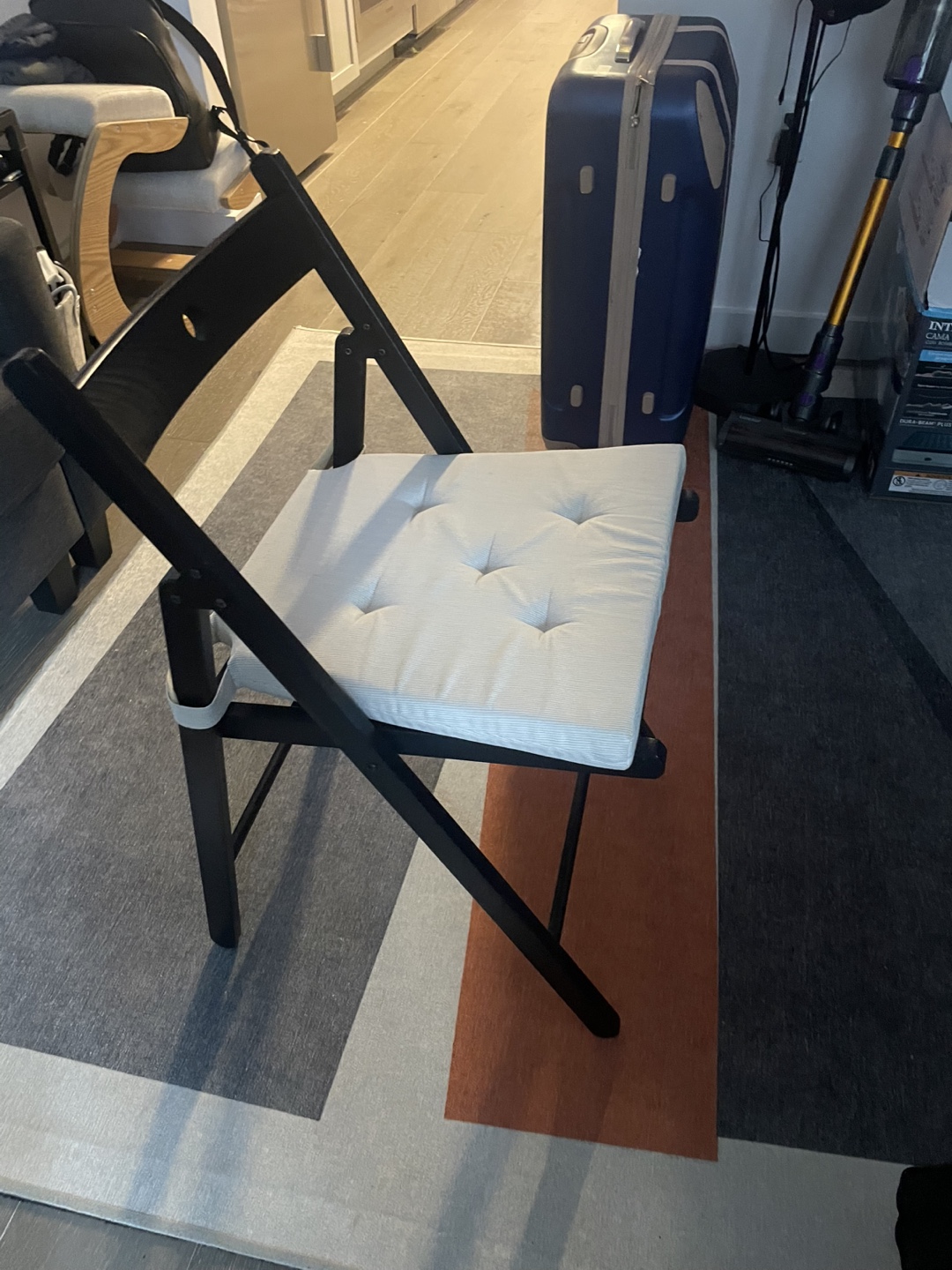 Pair of Black Folding Chairs with Cushions - photo 2
