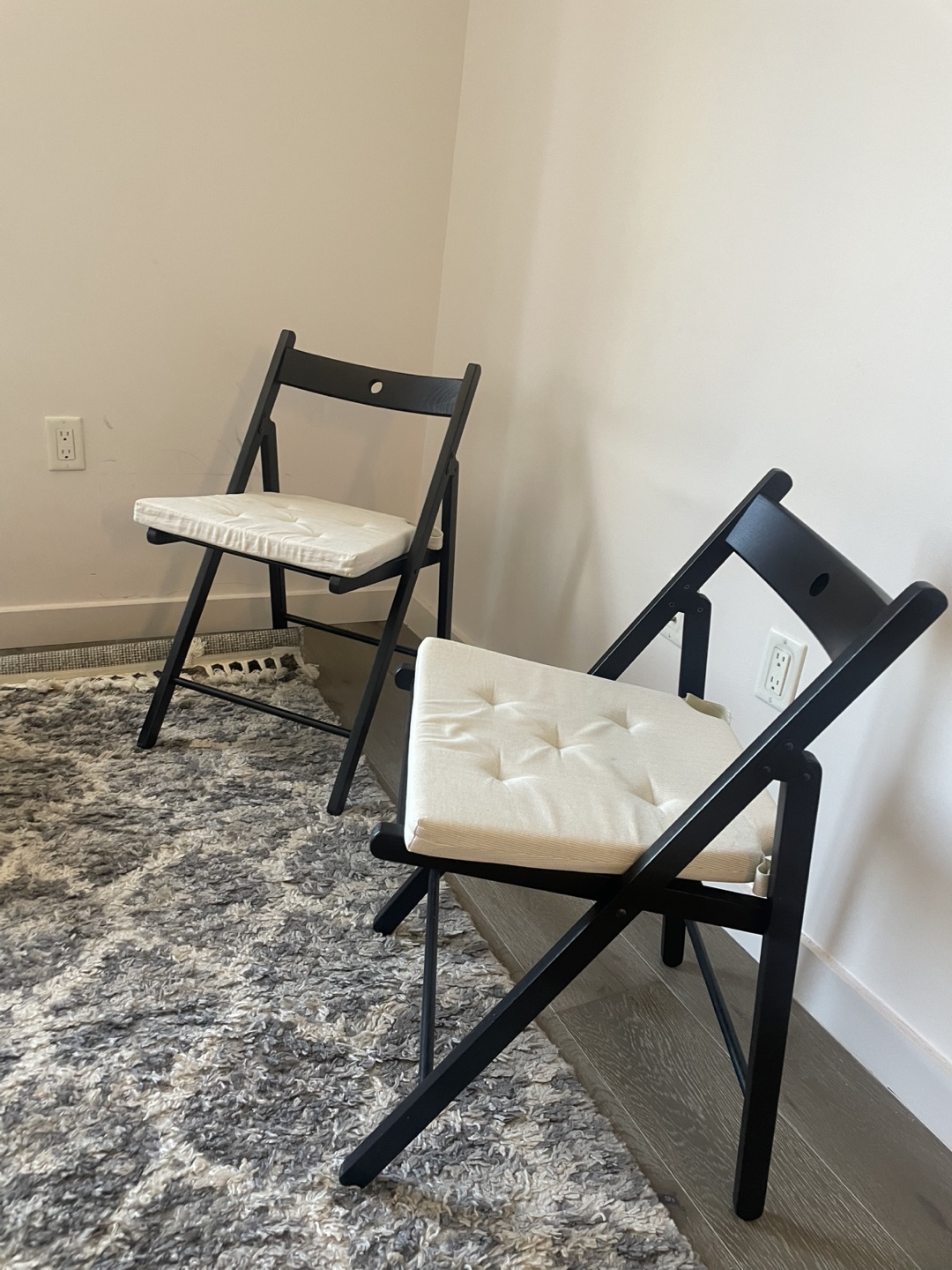 Pair of Black Folding Chairs with Cushions