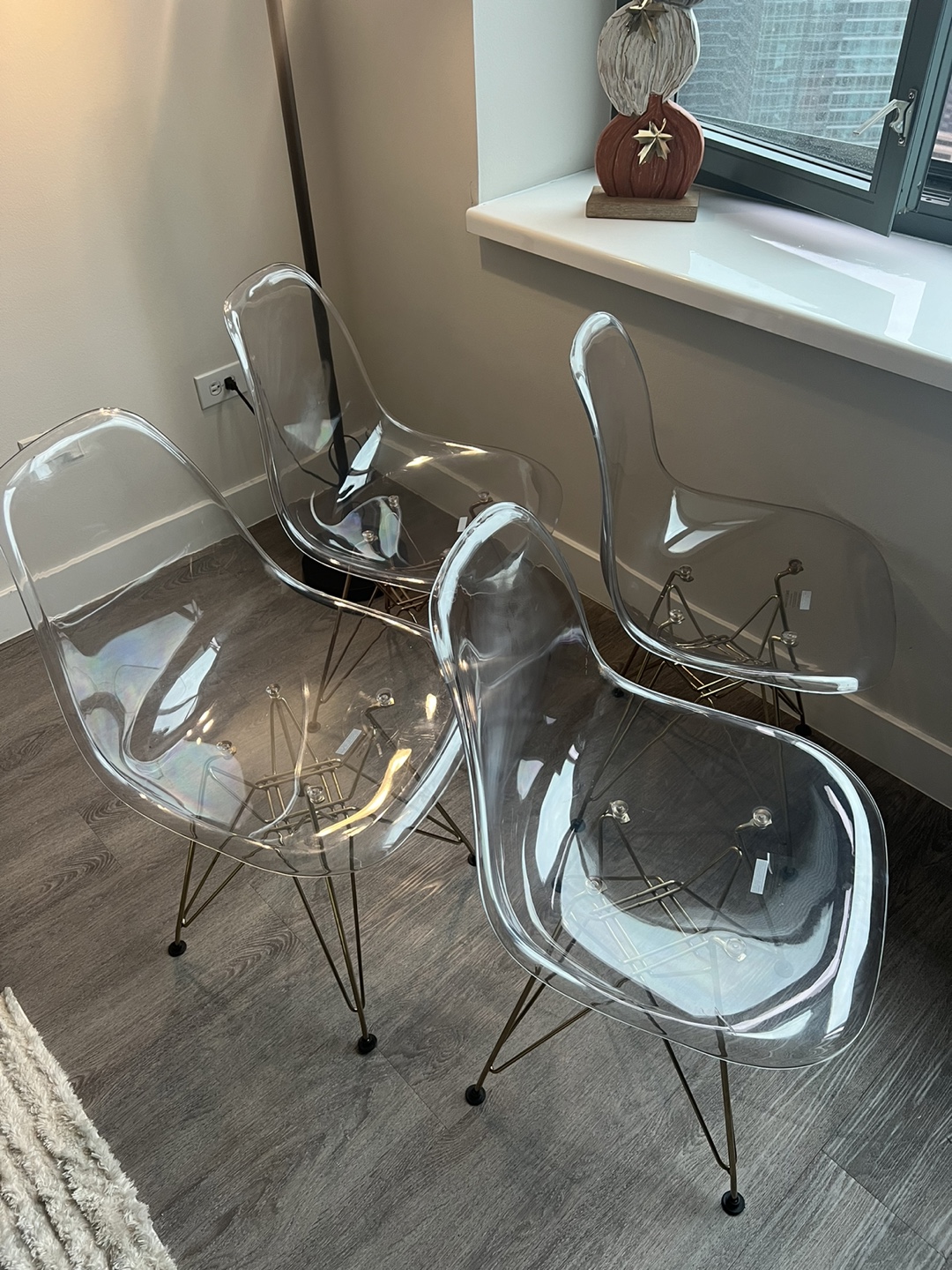 Set of Four Clear Acrylic Dining Chairs with Gold Legs