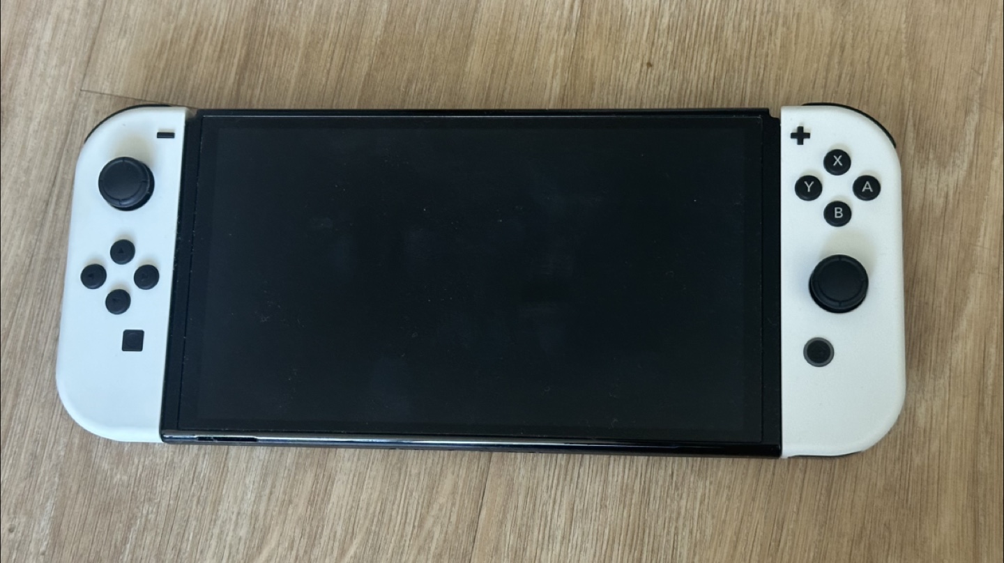 Nintendo Switch OLED – White Joy-Con (Very Good Condition)