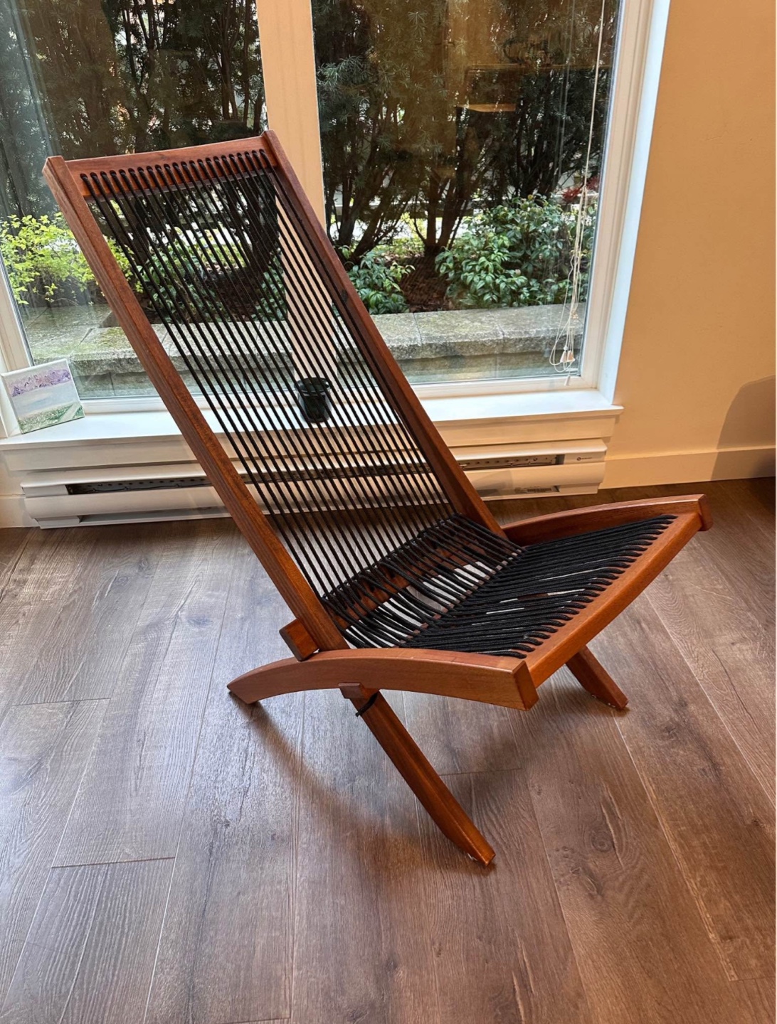 Relaxing wooden Ikea chair.