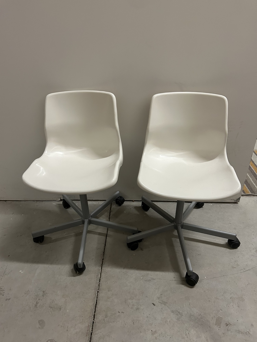 Pair of White Swivel Chairs