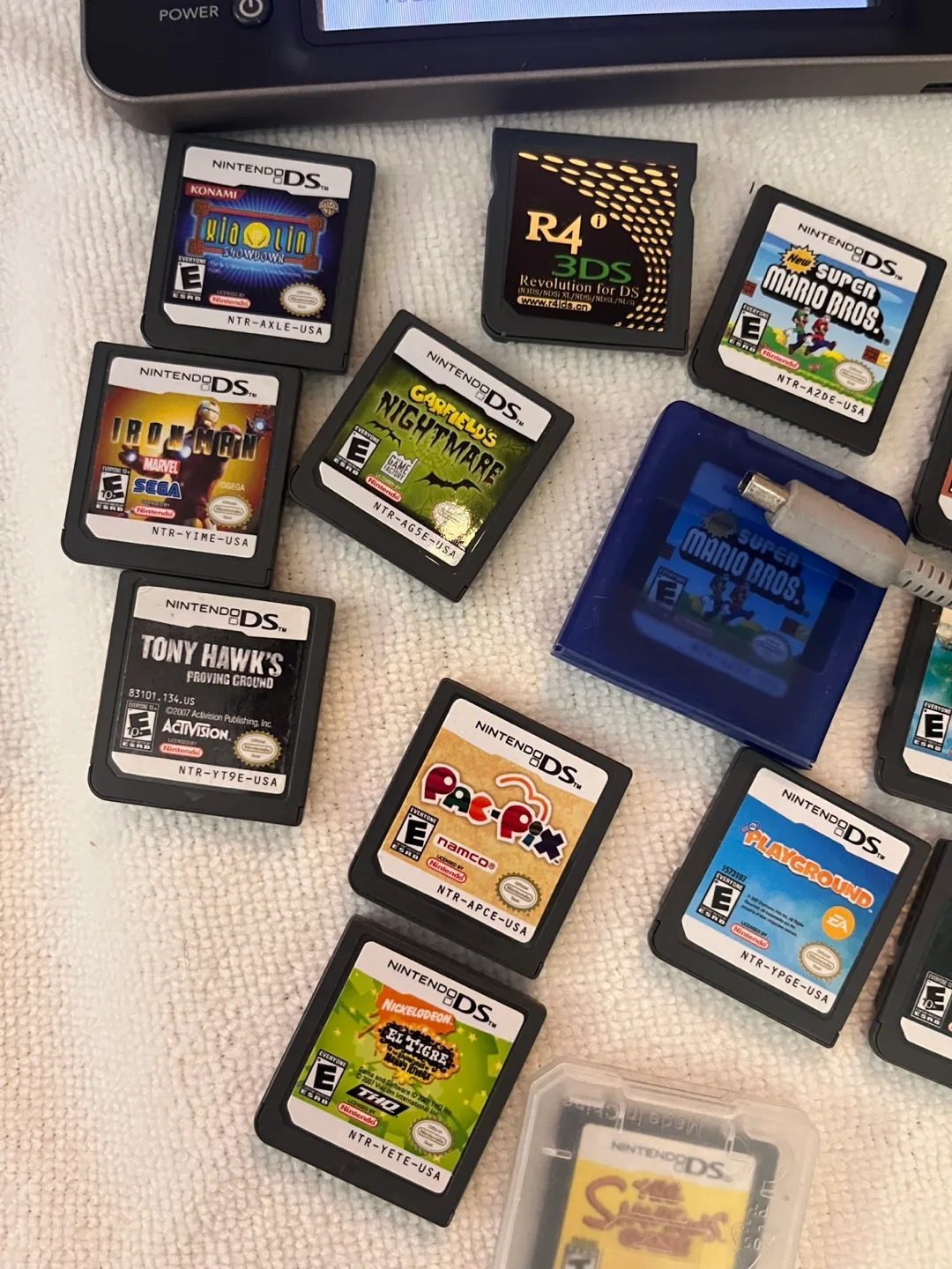 Nintendo DS Lite with 15 Games + Charger image indicator(3)