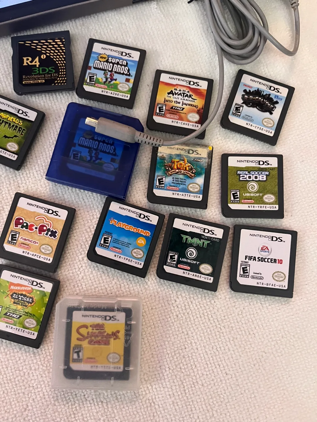 Nintendo DS Lite with 15 Games + Charger image indicator(4)