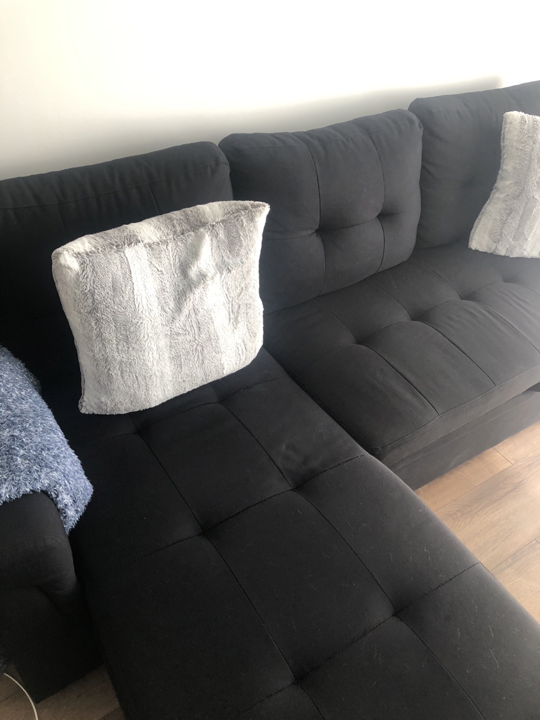 Black Sectional Sofa with Pull-Out Sleeper