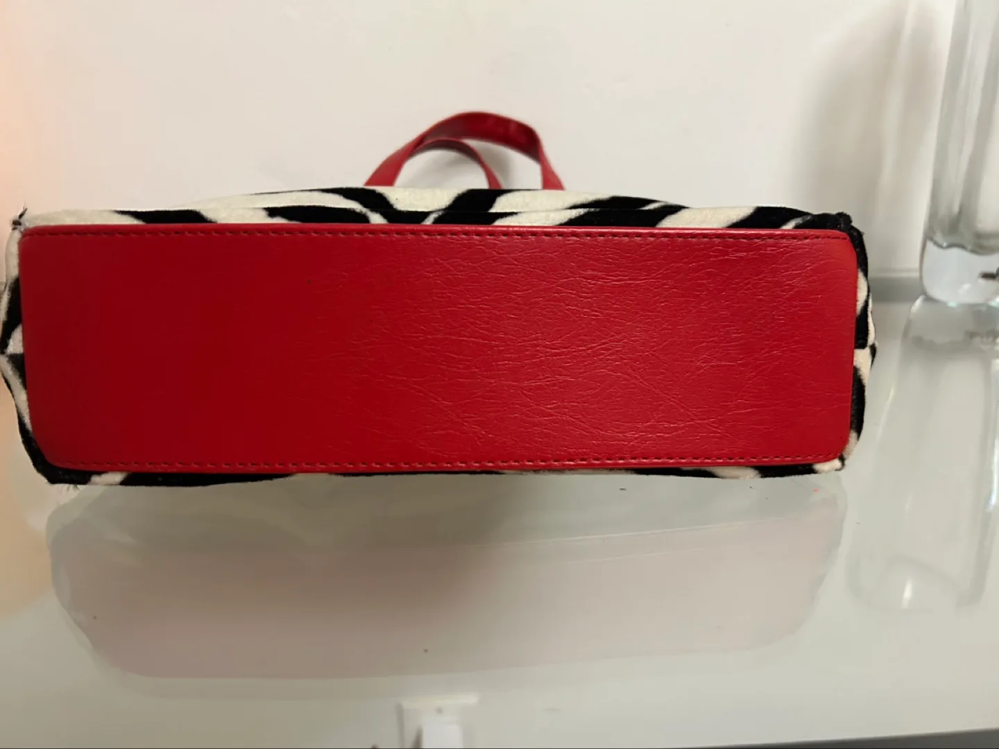 Zebra Print Handbag with Red Accents image indicator(3)