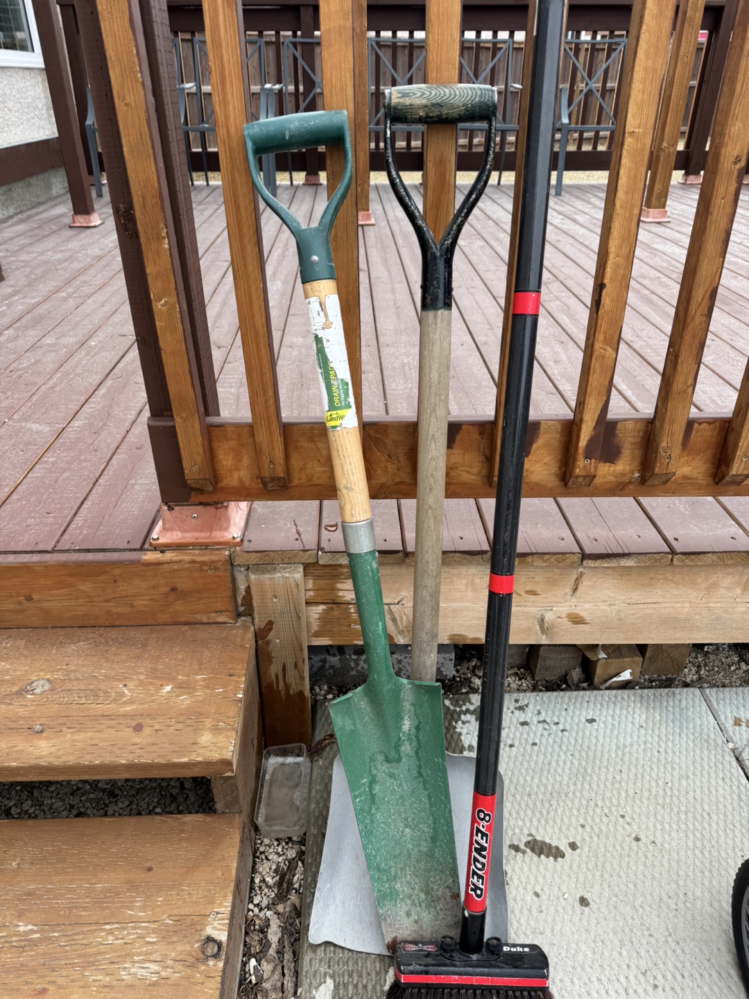Three Gardening Tools: Shovel, Spade, and Broom