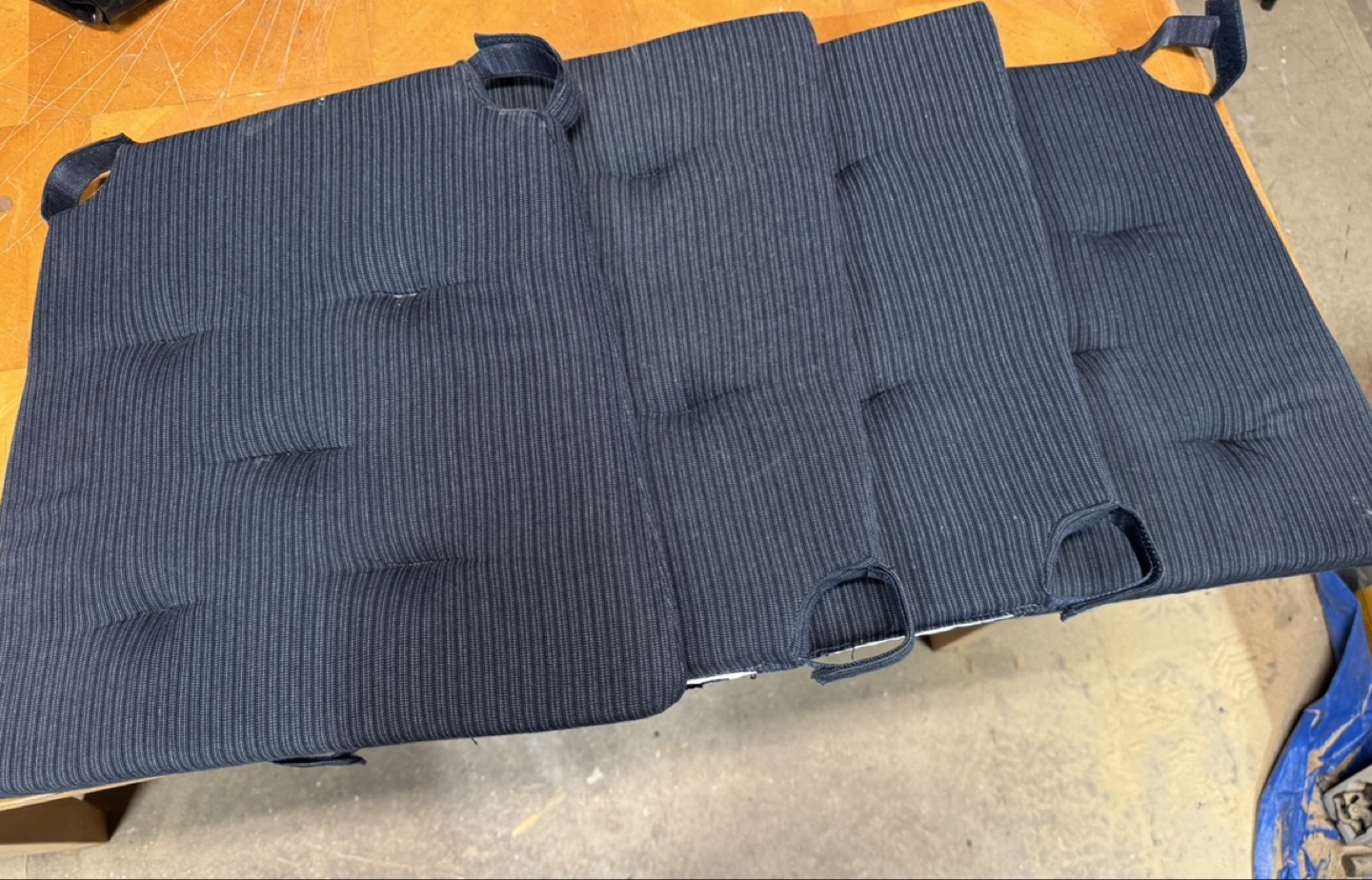 4 blue cushions chair