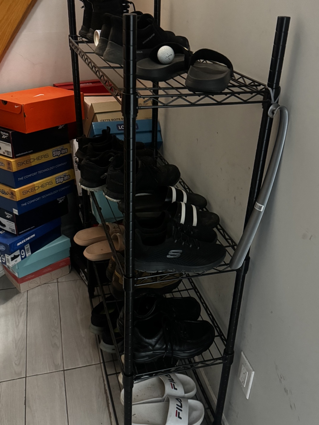 Multi-tier shoe rack with various footwear