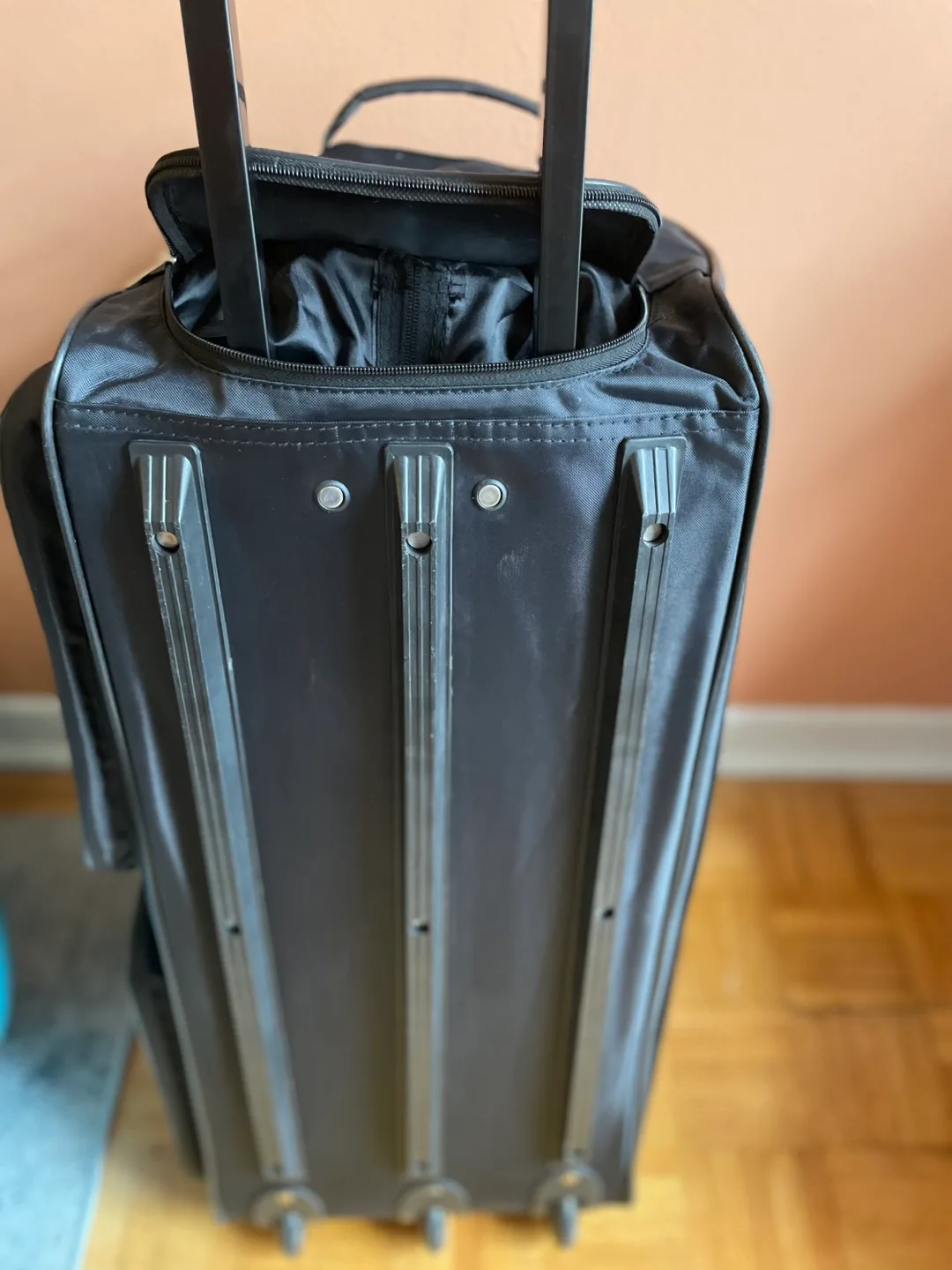 Large Black Rolling Duffle Bag image indicator(2)