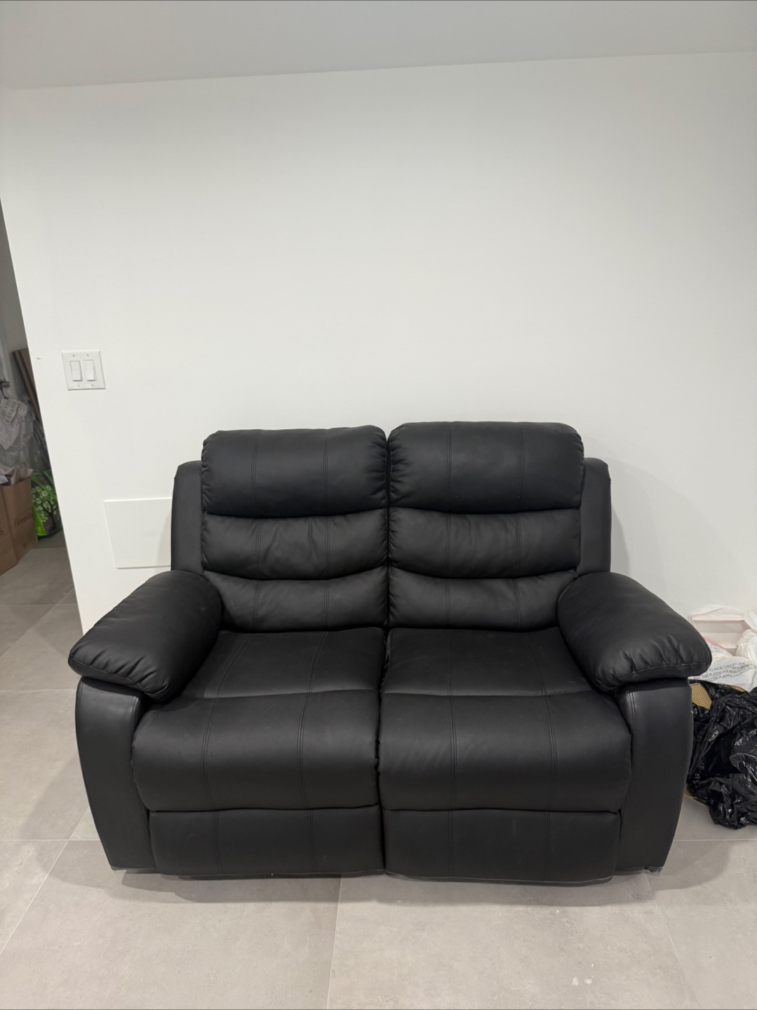 Black Leather Reclining Loveseat