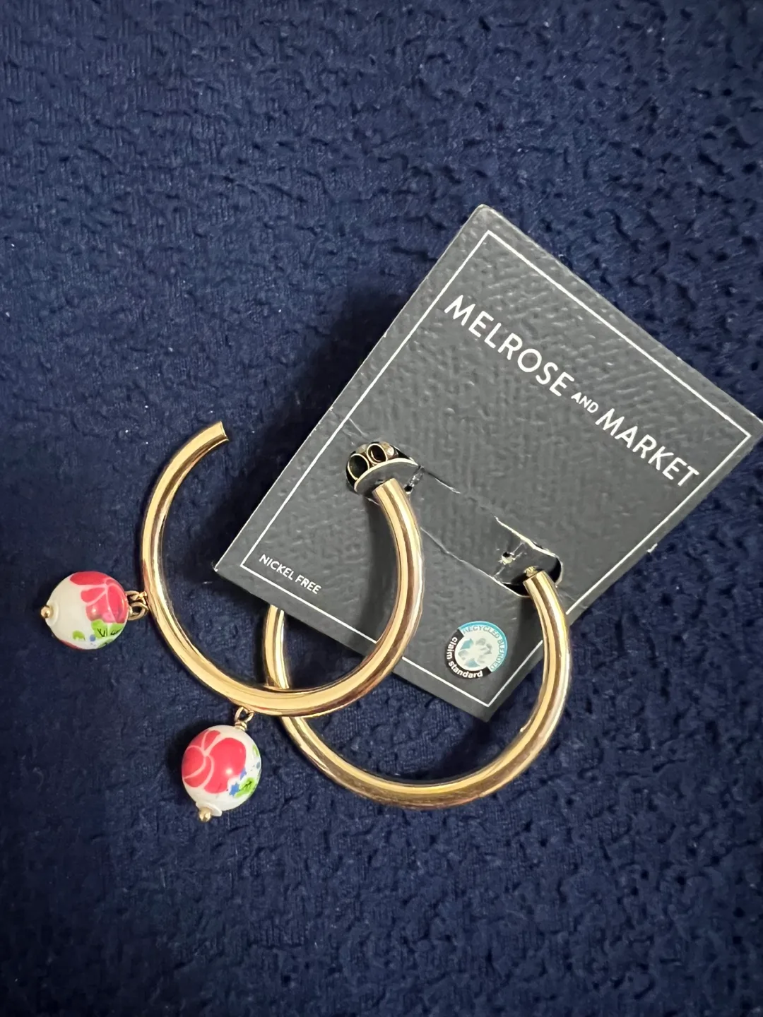 Gold Hoop Earrings with Floral Detail thumbnail