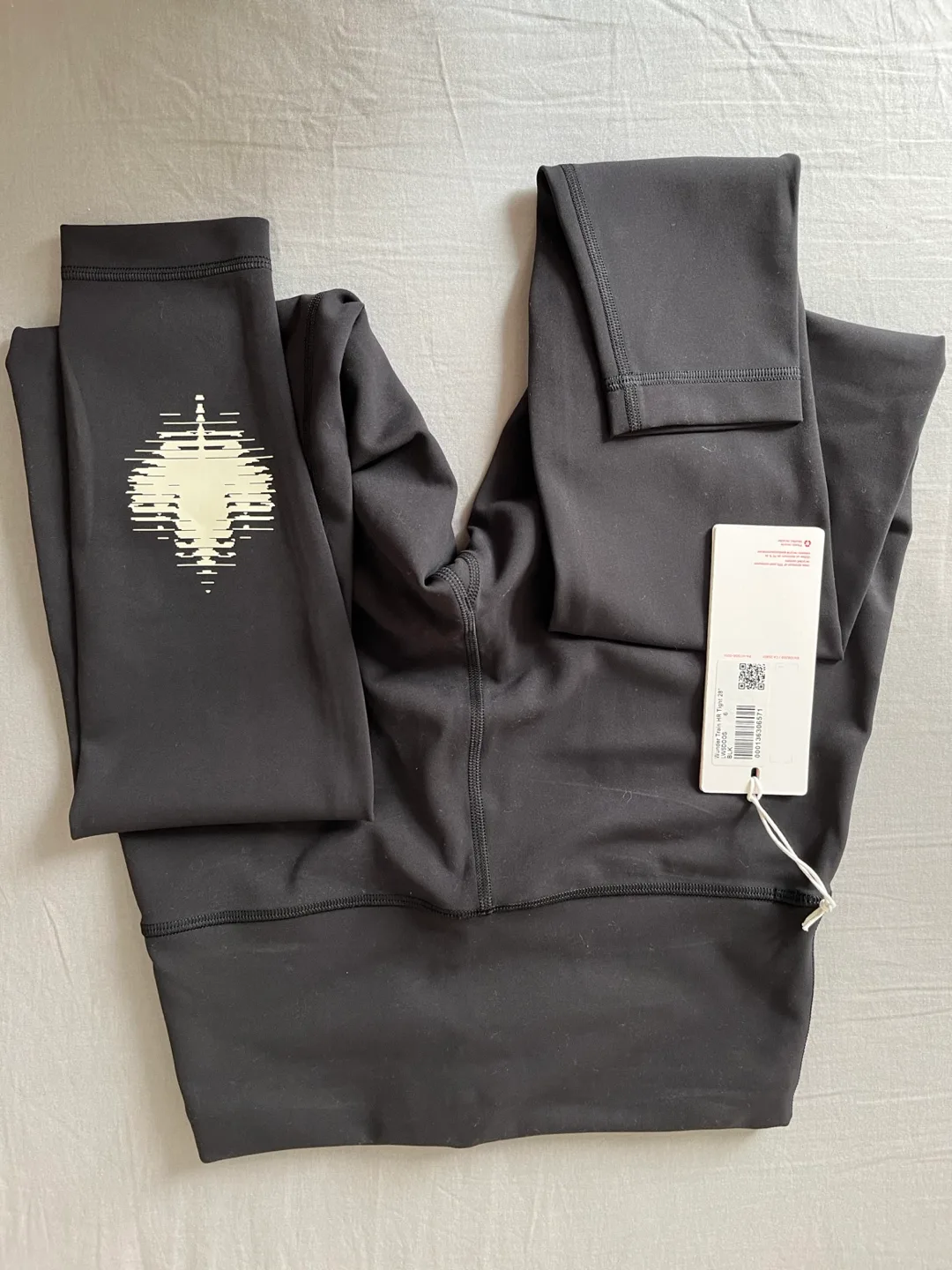 Lululemon Black High-Rise Leggings with Maple Leaf Graphic image indicator(2)