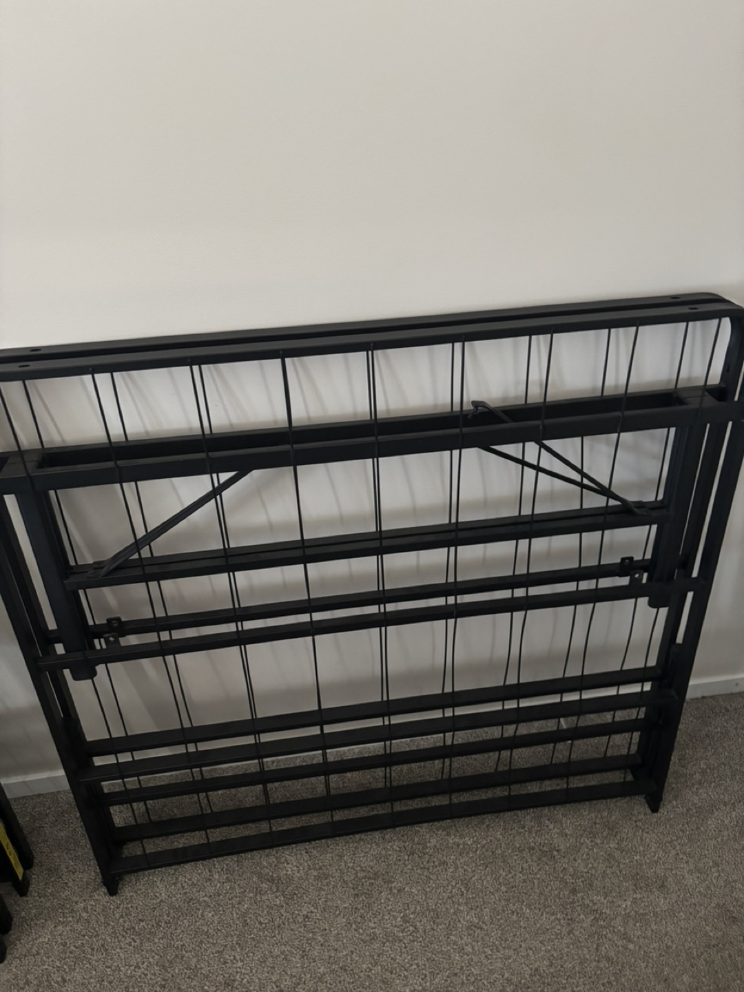 Black metal folding twin bed frame