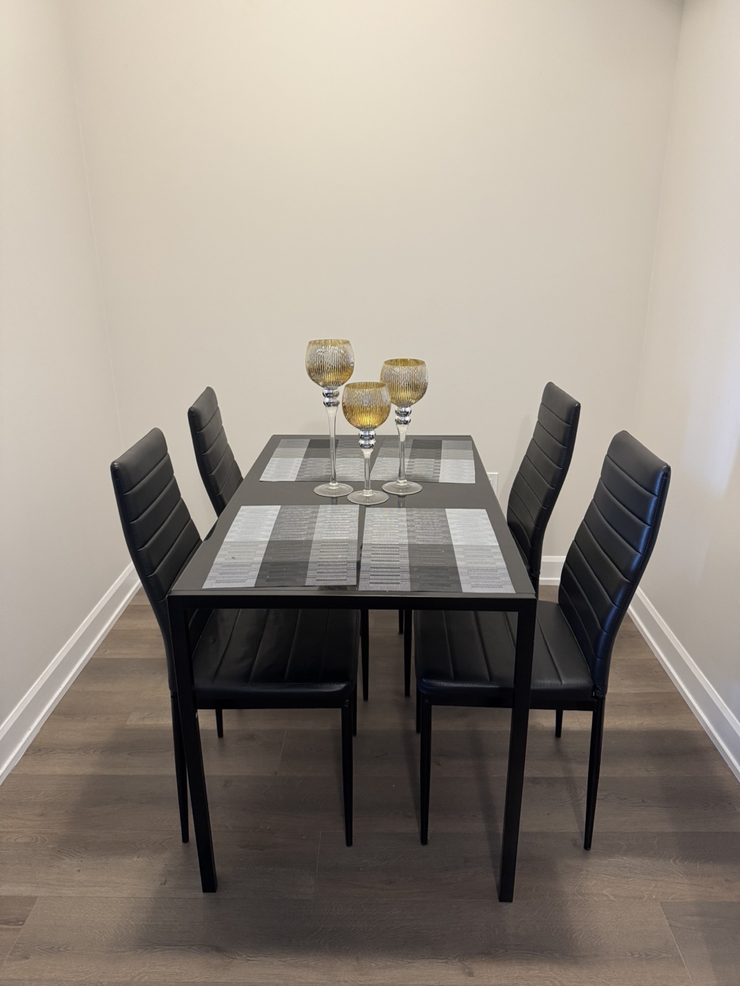 Glass-top Dining Table Set with Four Black PU Leather Chairs