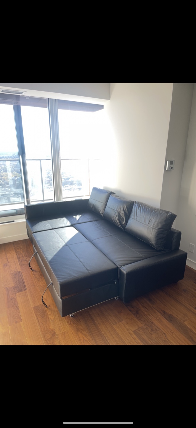 Black IKEA pull out couch - photo 2