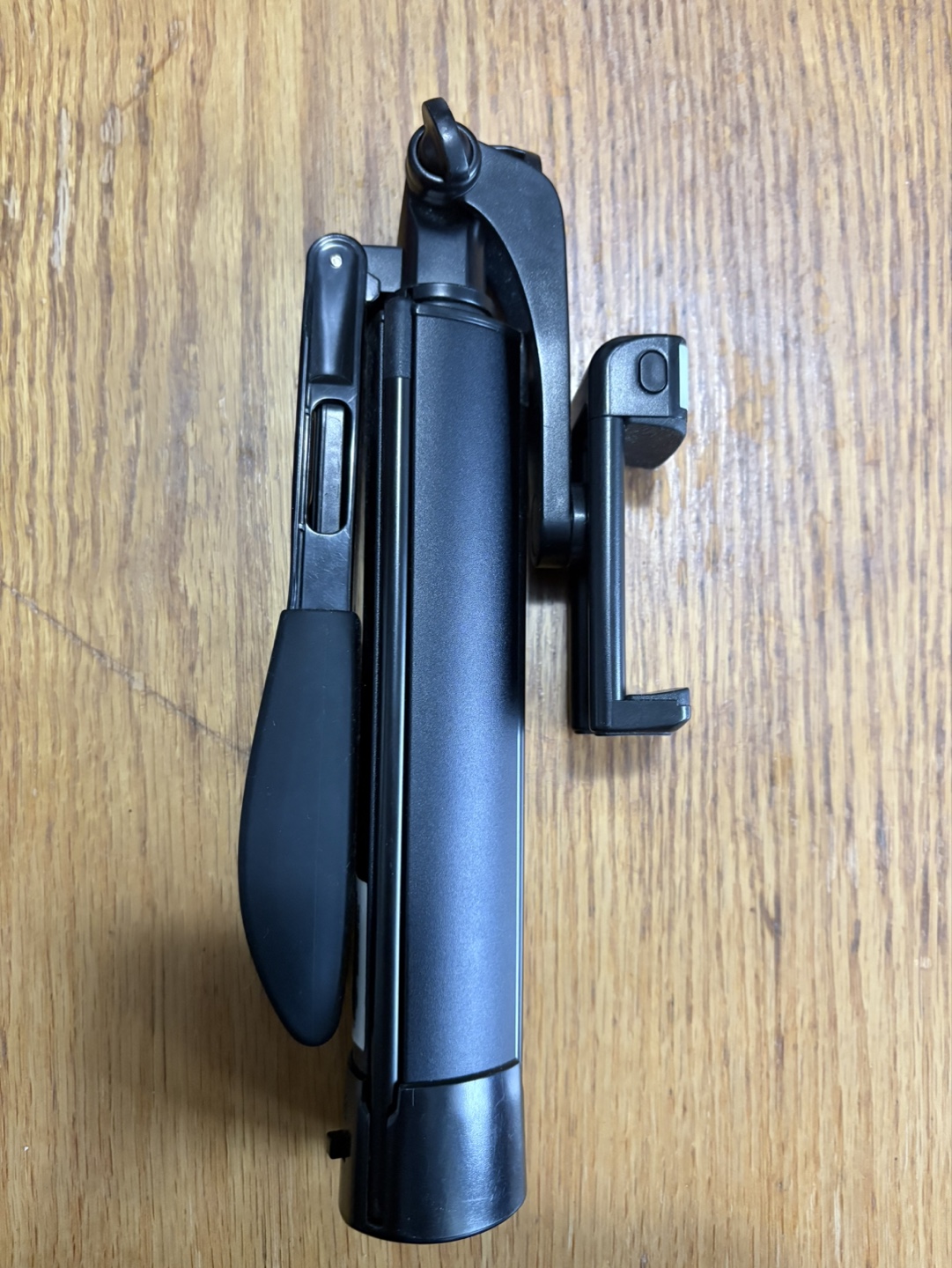 Phone stabilizer tripod with remote shutter and assist light