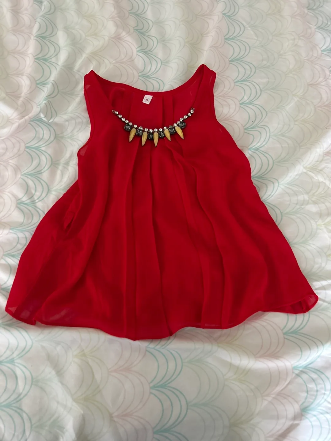 Red sleeveless chiffon blouse with embellished neckline thumbnail
