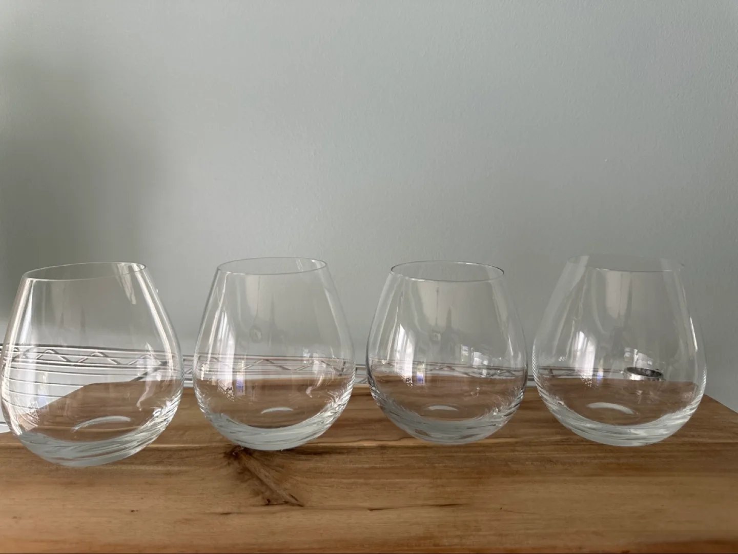 Set of four clear stemless wine glasses thumbnail