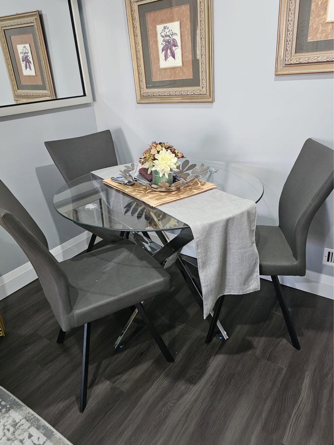 Glass top dining table with four grey chairs - photo 2