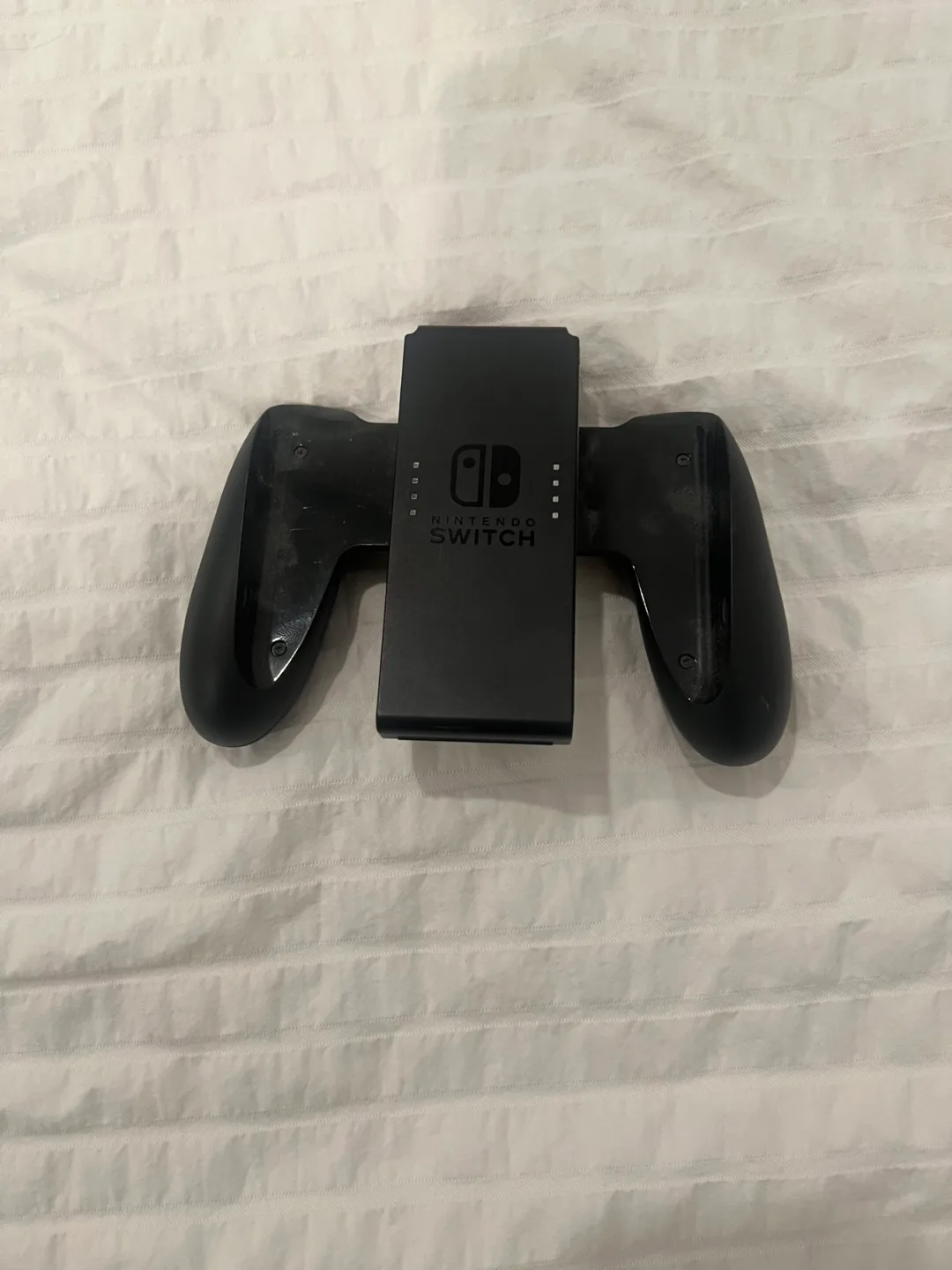 Nintendo Switch with Grip, Case, and Games image indicator(6)