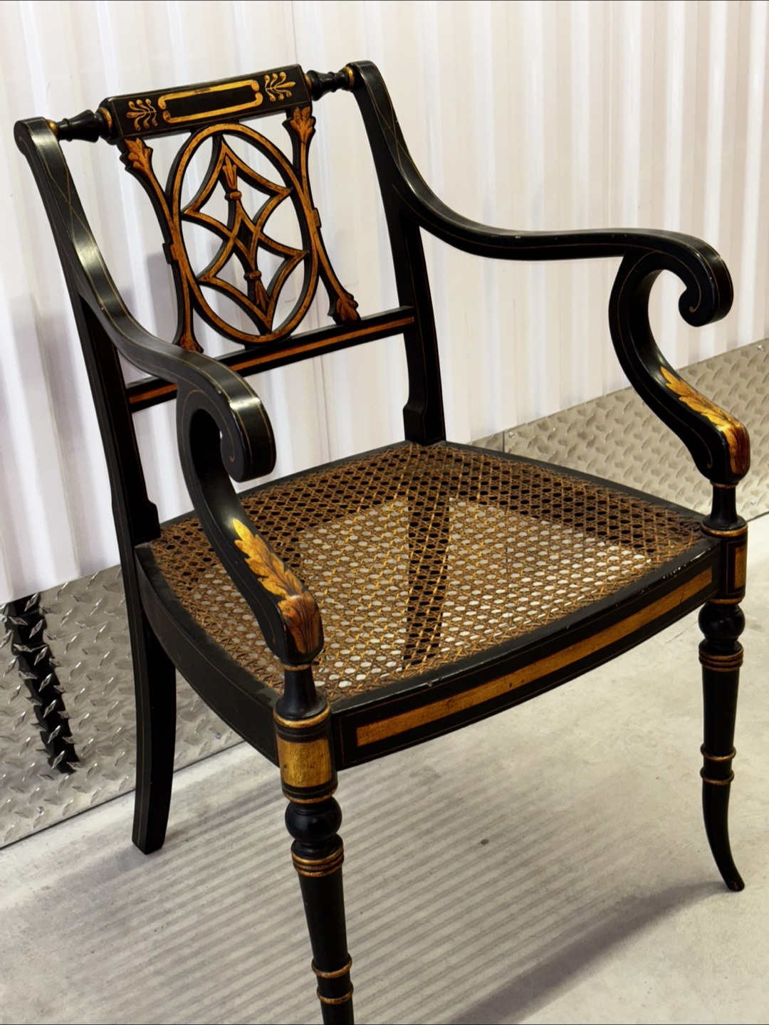Regency style ebonized wooden chair