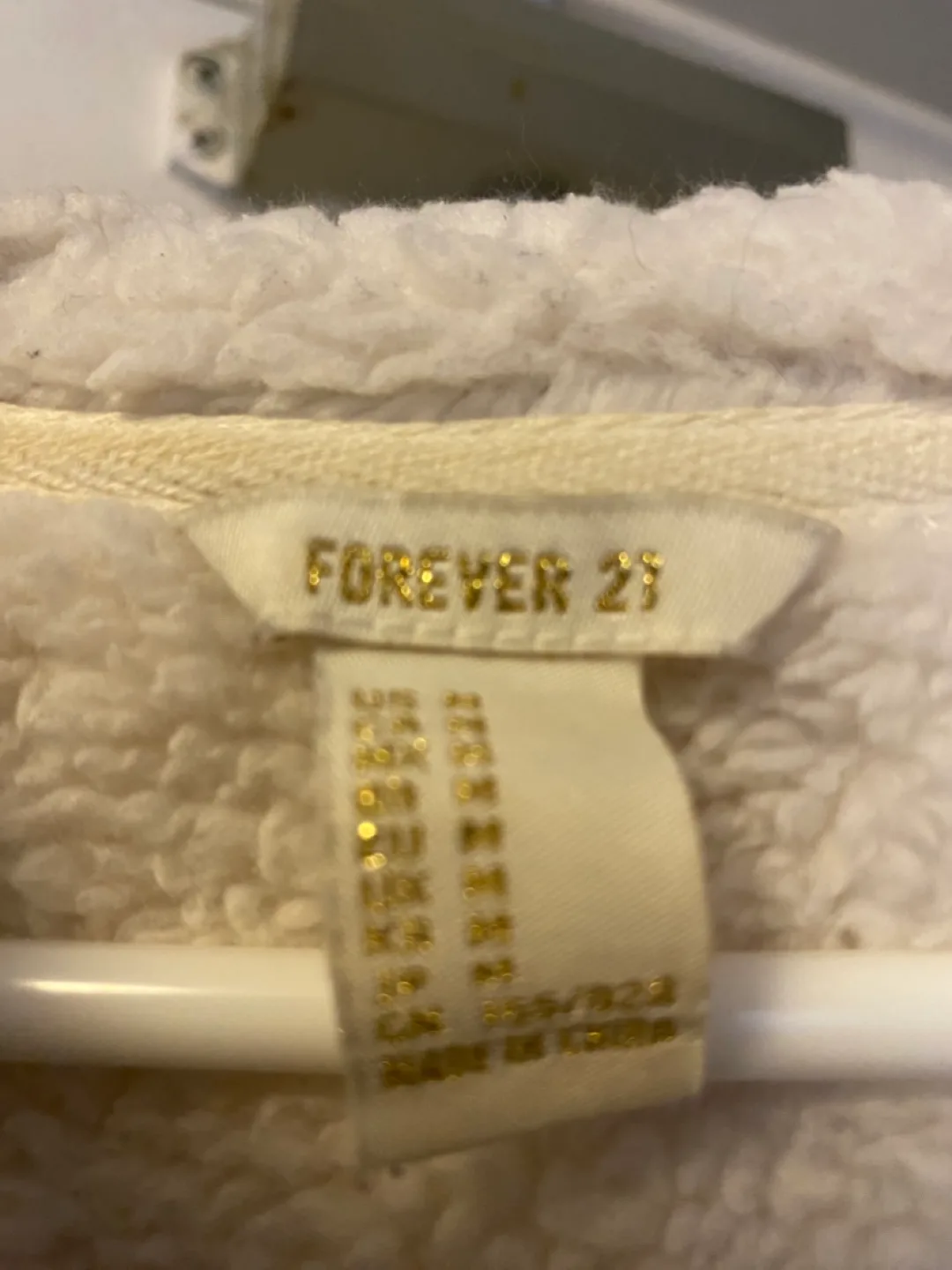 Forever 21 Cream-coloured sherpa zip-up hoodie image indicator(3)