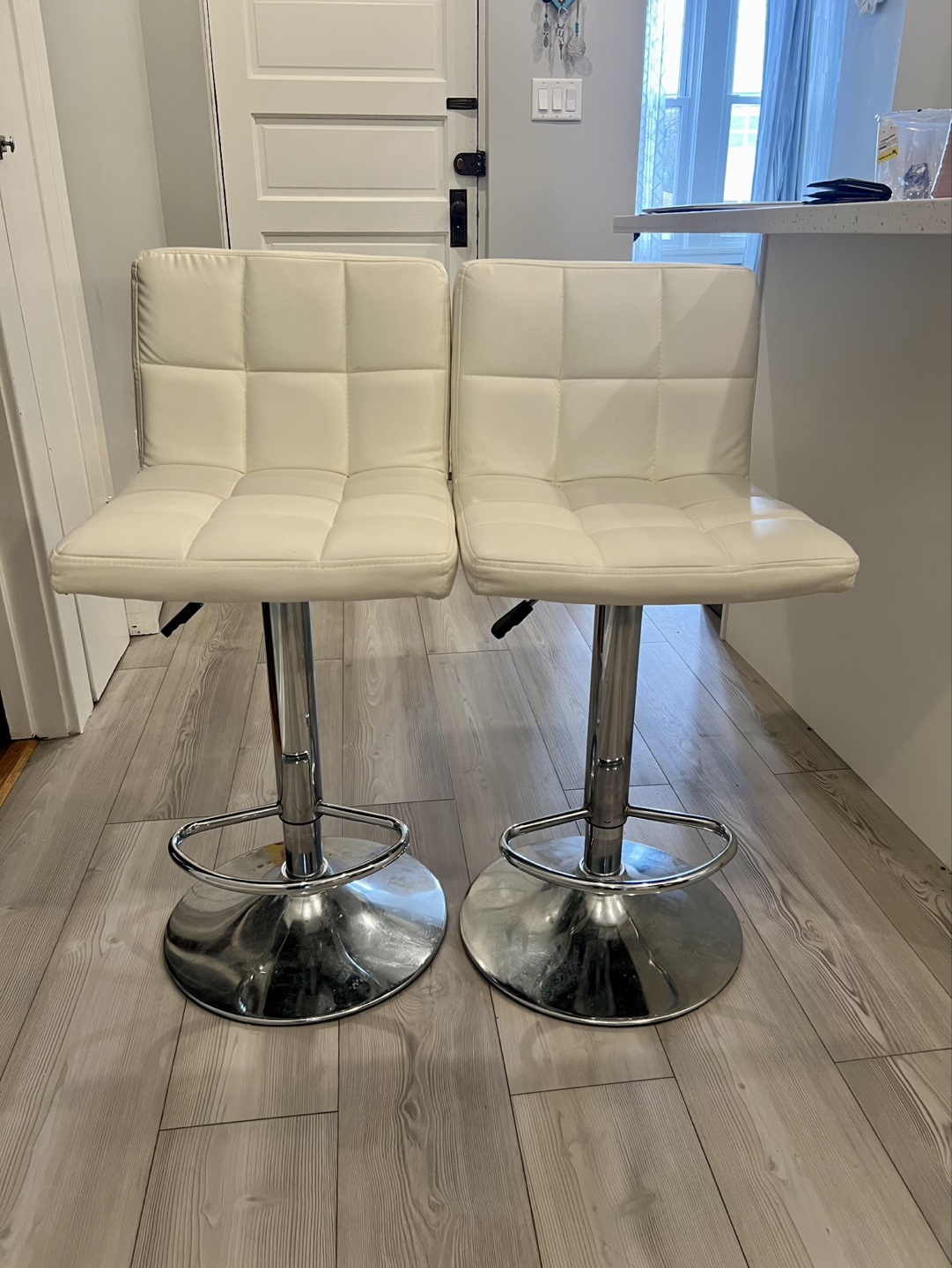 Pair of White Leather Bar Stools with Adjustable Height