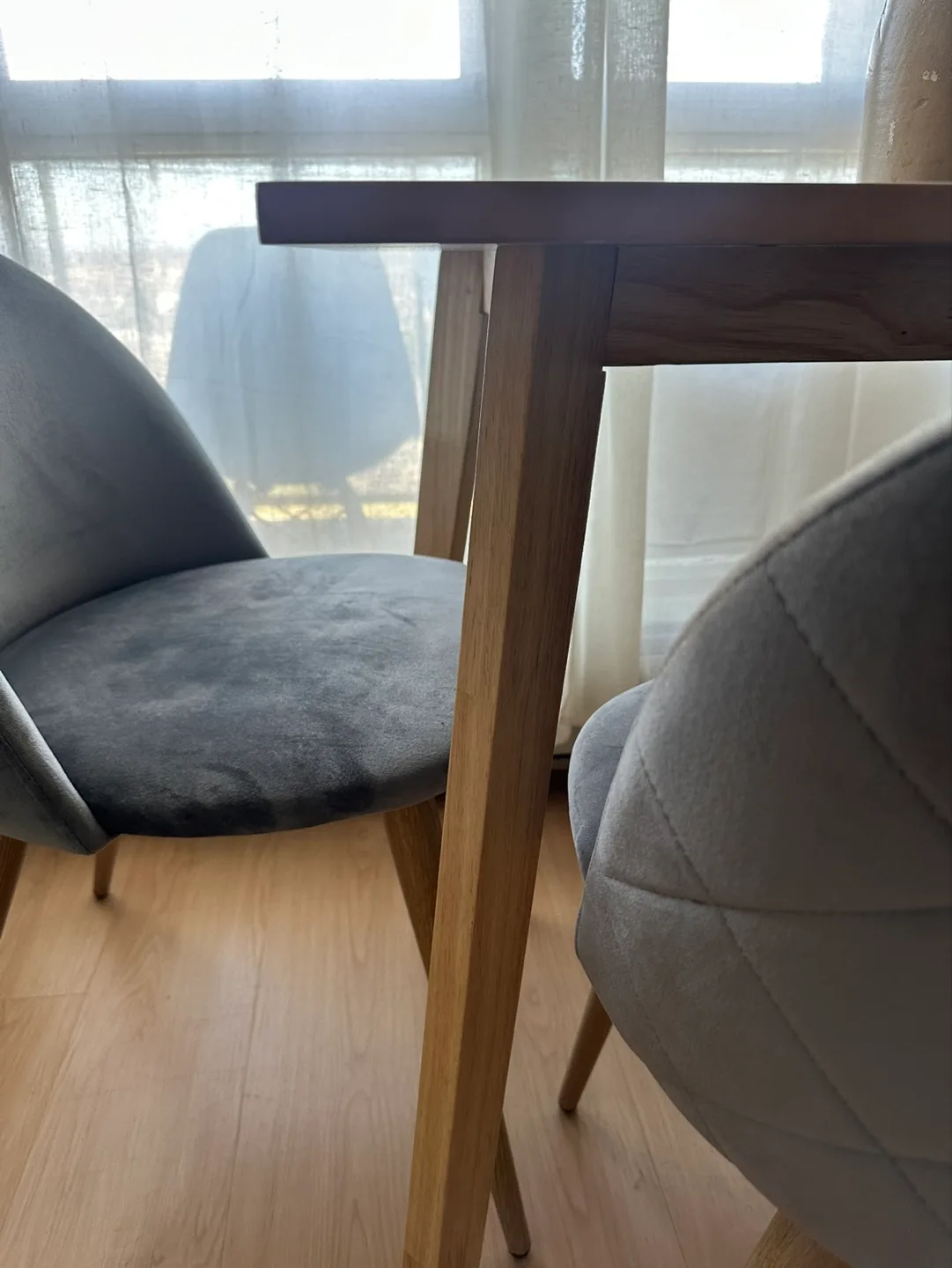 Set of Four Grey Velvet Dining Chairs with Light Wood Legs image indicator(4)