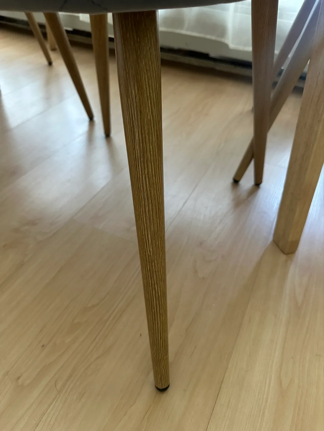 Set of Four Grey Velvet Dining Chairs with Light Wood Legs image indicator(5)