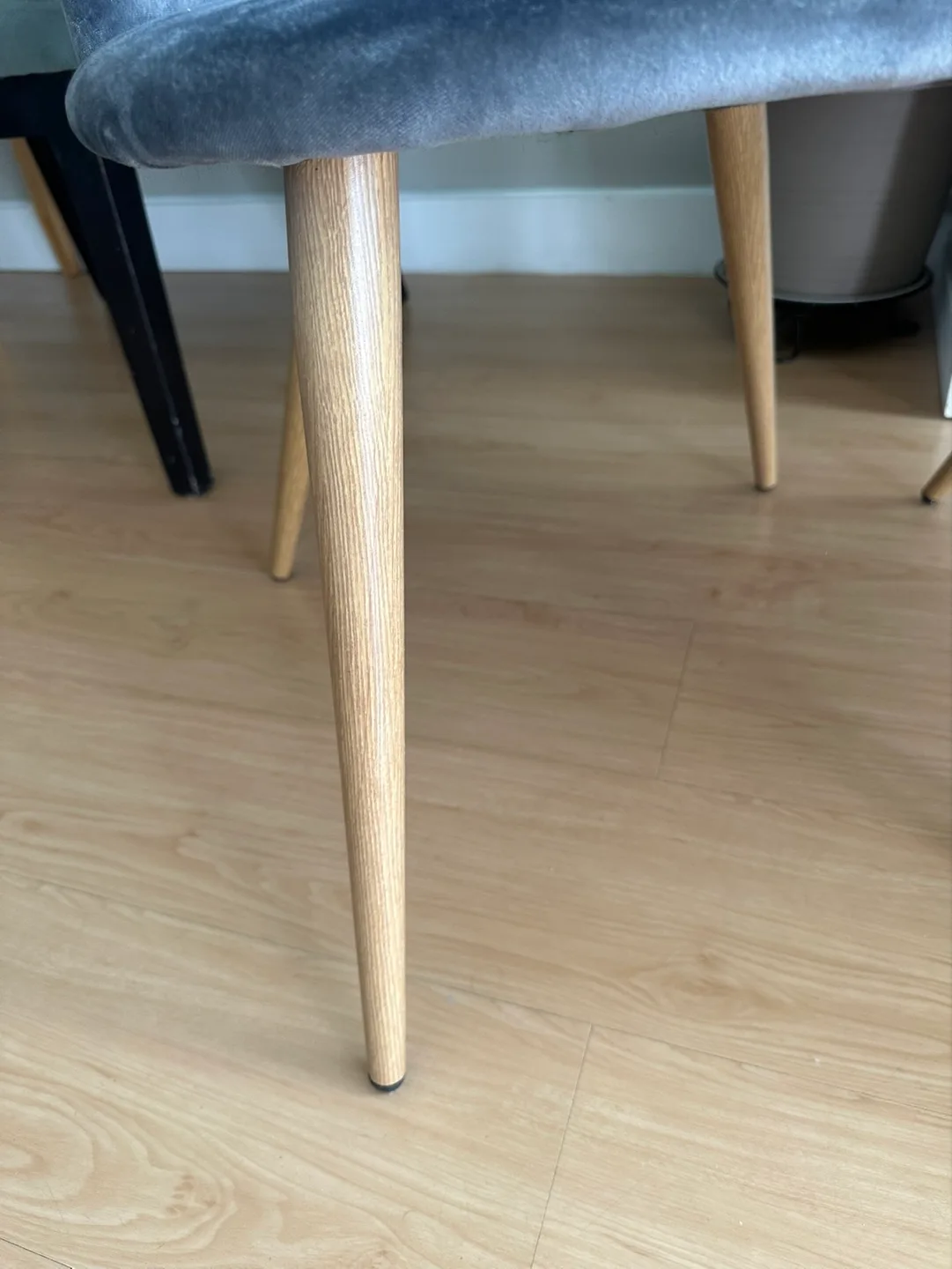 Set of Four Grey Velvet Dining Chairs with Light Wood Legs image indicator(7)