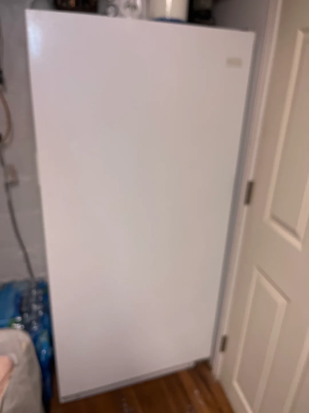 White Frigidaire upright freezer