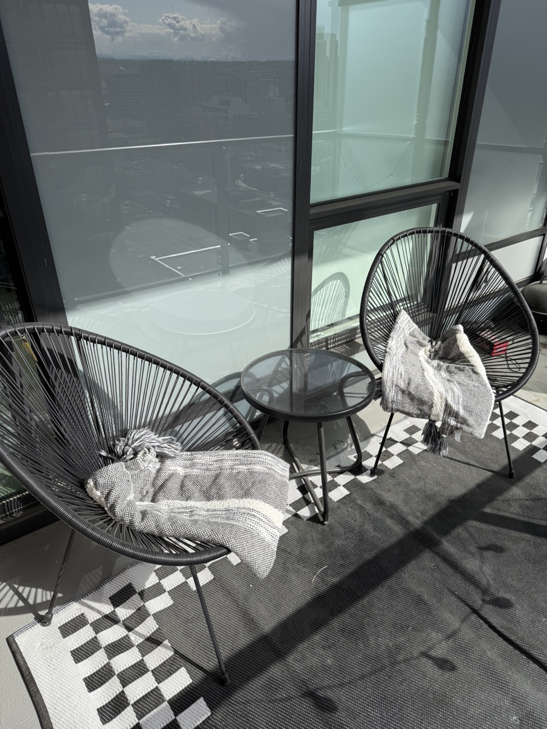 Pair of Black Patio Chairs with Side Table