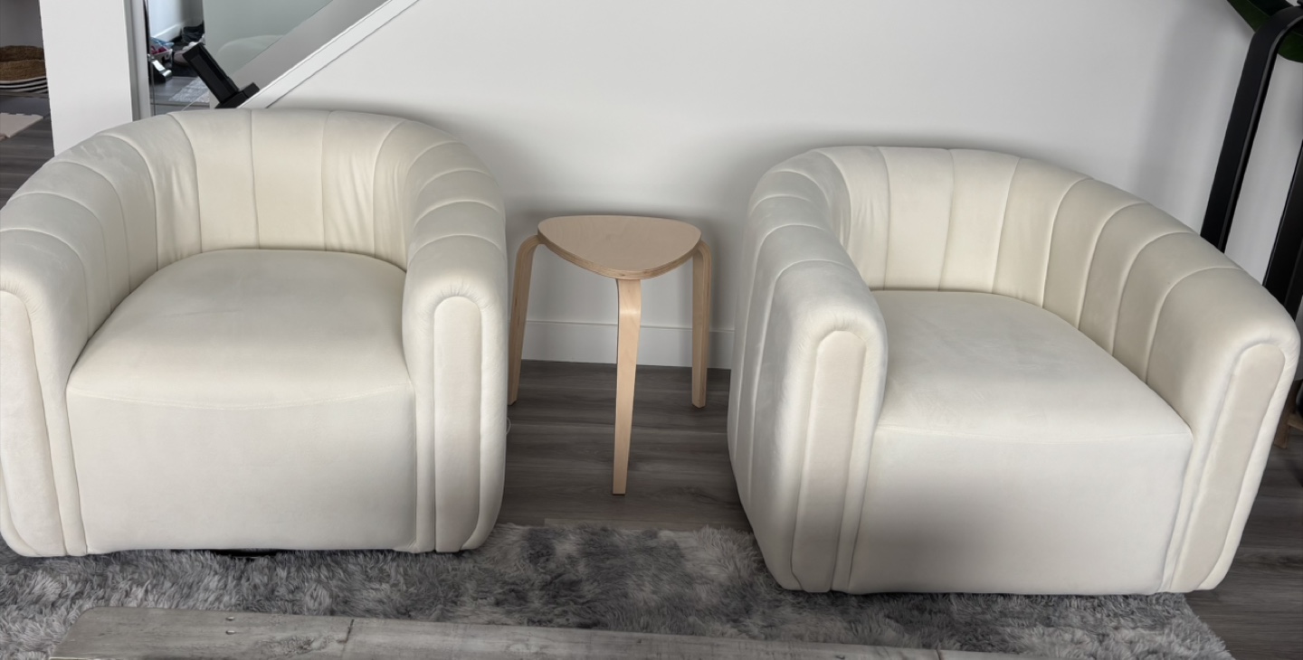 Pair of Cream Velvet Swivel Accent Chairs