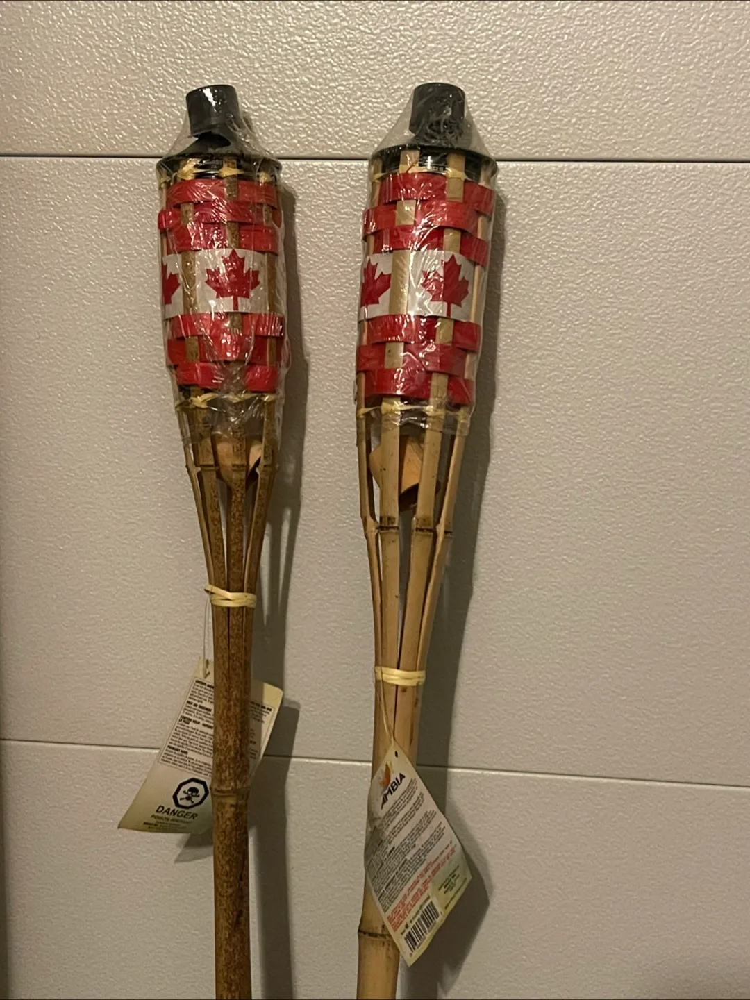 Pair of Canadian Flag Bamboo Tiki Torches image indicator(2)